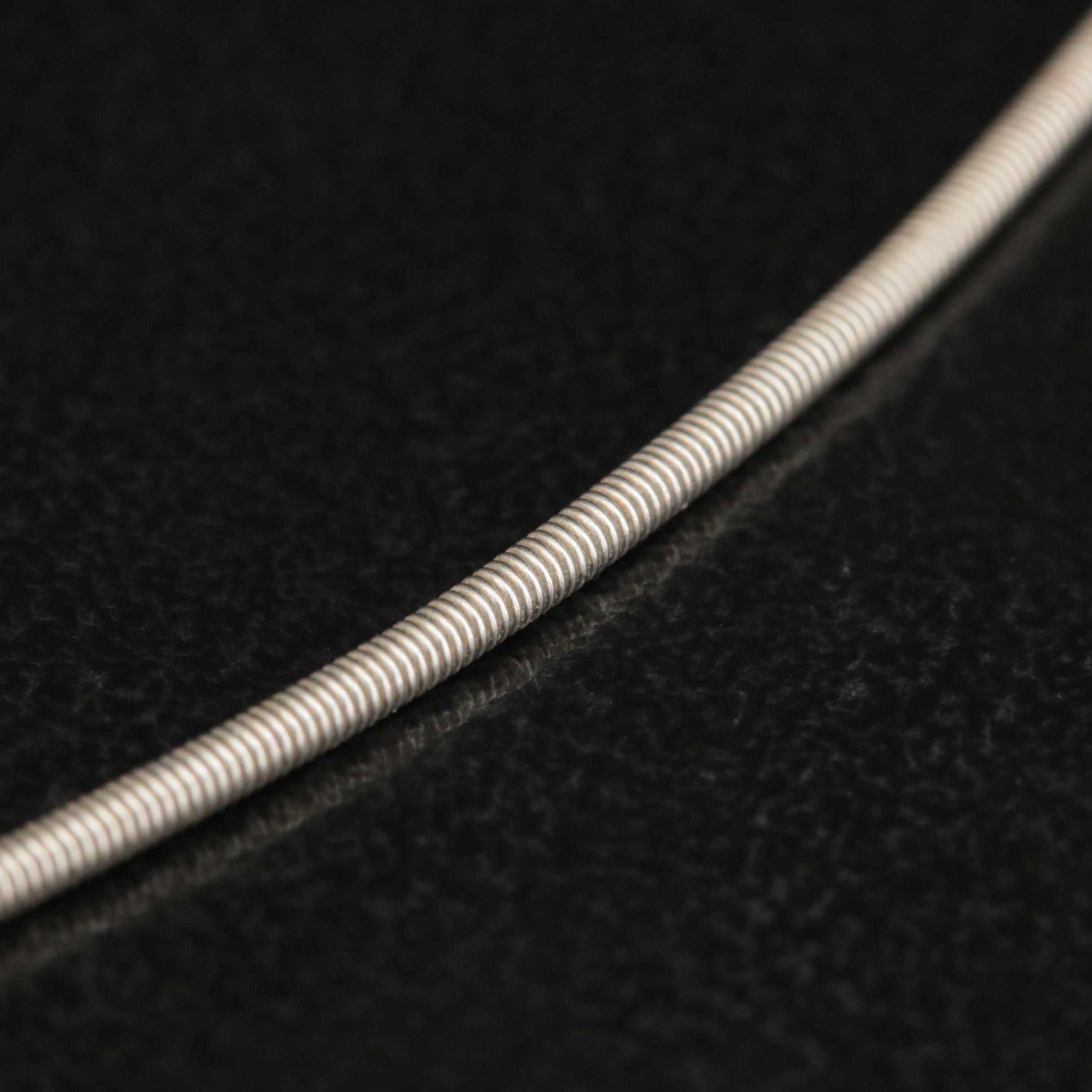 18K 0.12 CT Diamond Solitaire Pendant on Snake Chain