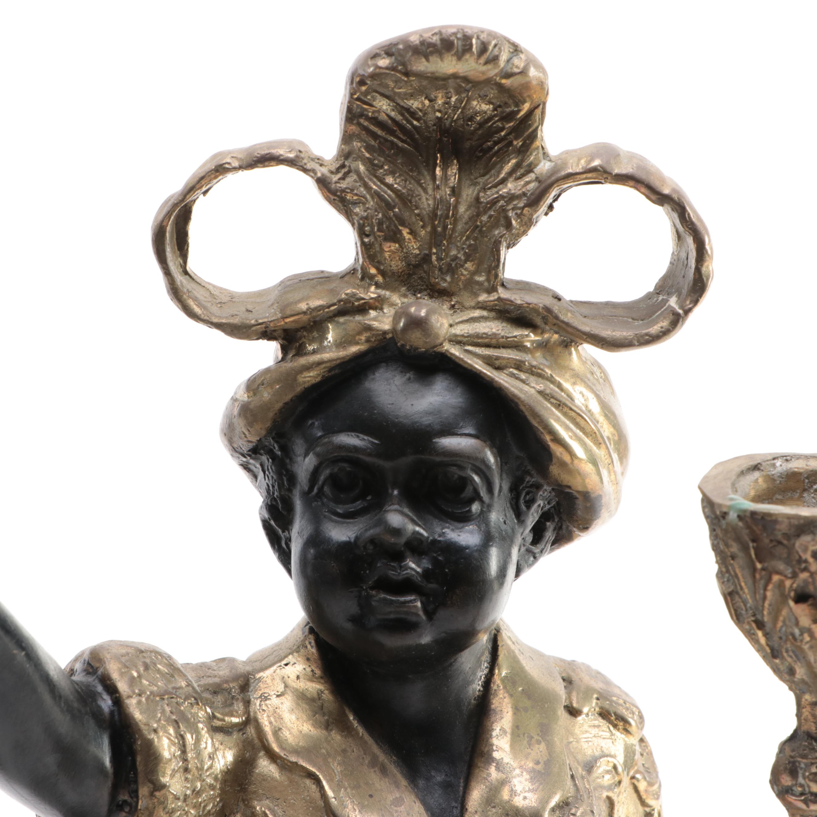 Pair of French Ebonized and Gilt Bronze Moor Figural Candle Holders