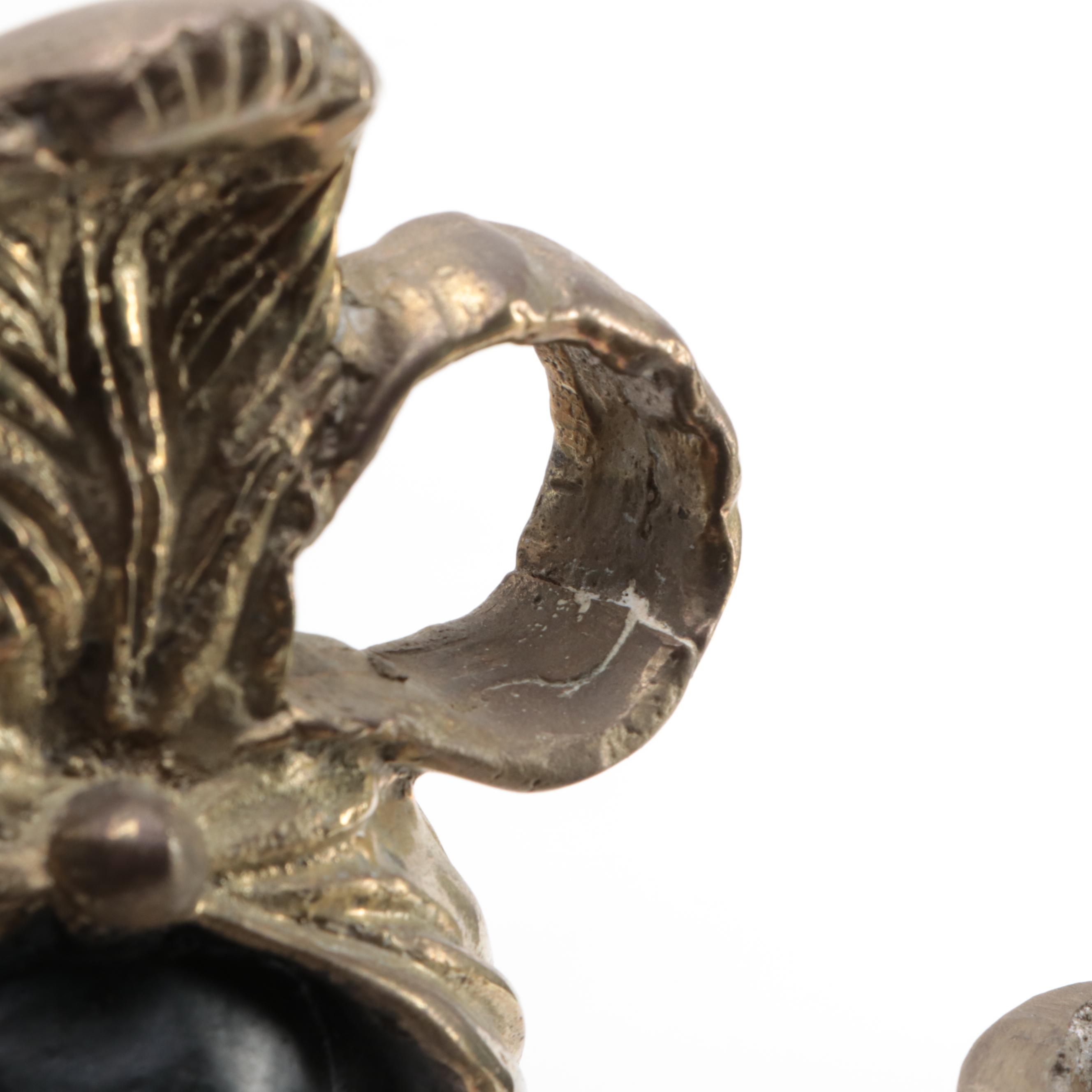 Pair of French Ebonized and Gilt Bronze Moor Figural Candle Holders