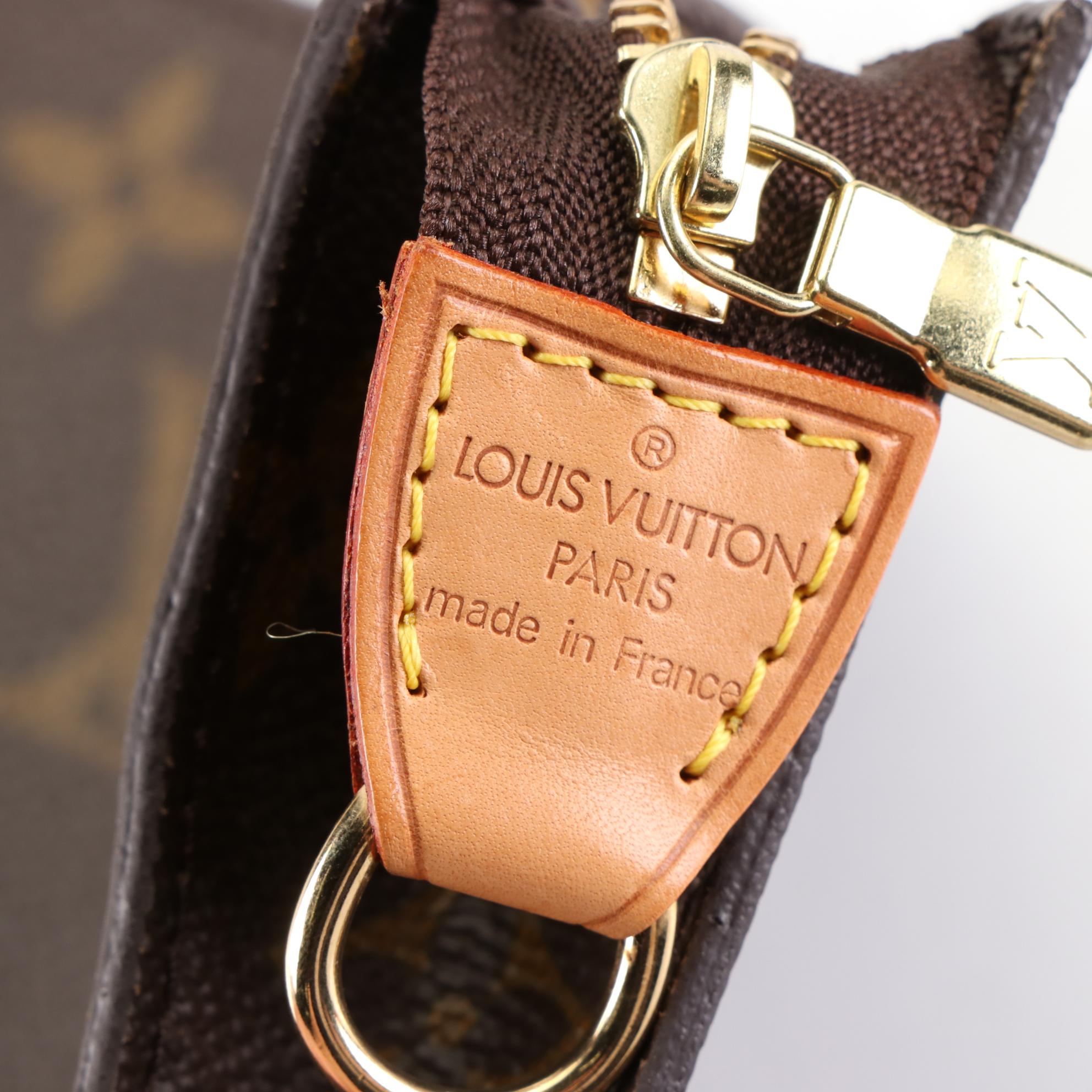 Louis Vuitton Bucket Bag GM in Monogram Canvas and Vachetta Leather with Pouch