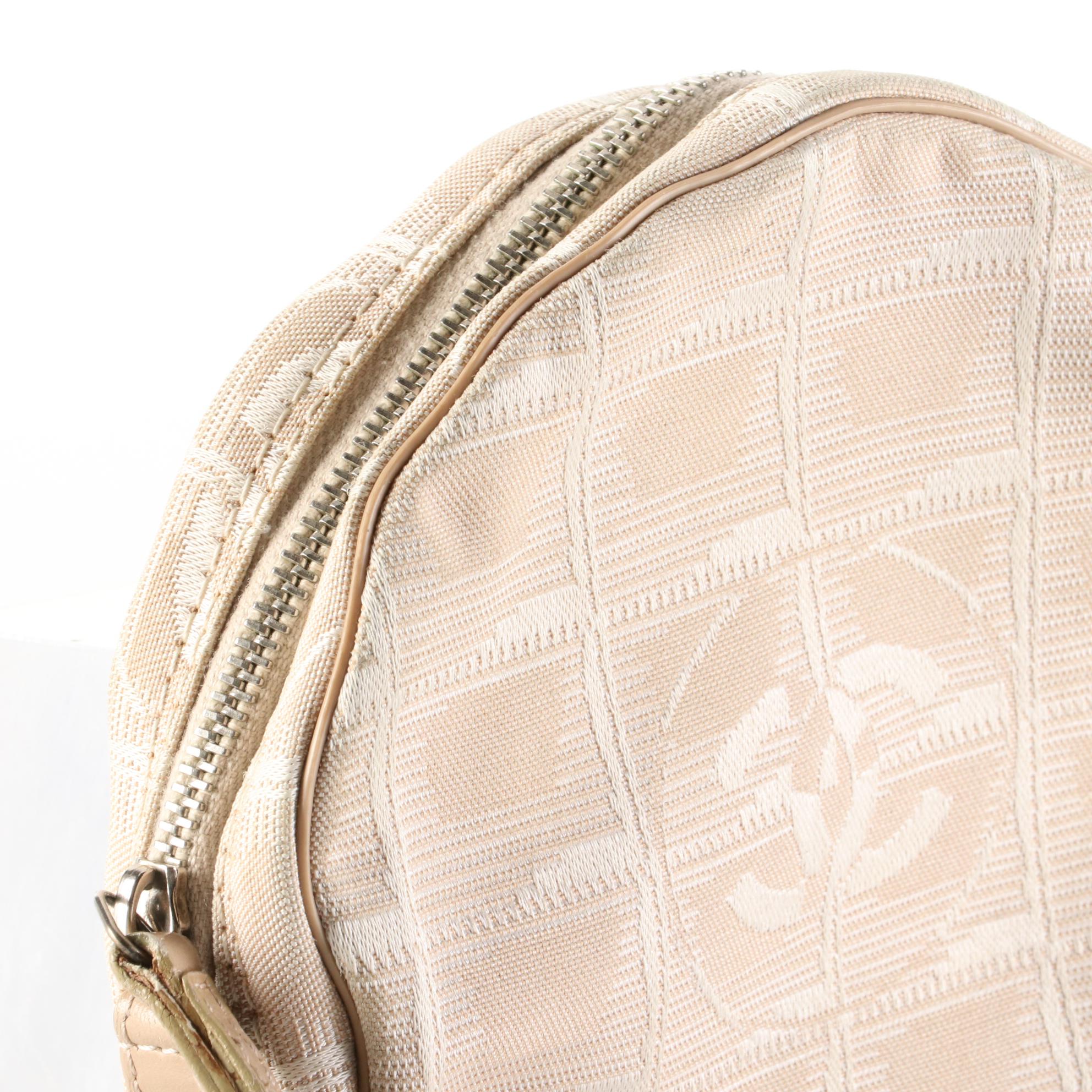 Chanel Travel Line Round Wristlet Pouch in CC Nylon Jacquard with Leather Trim