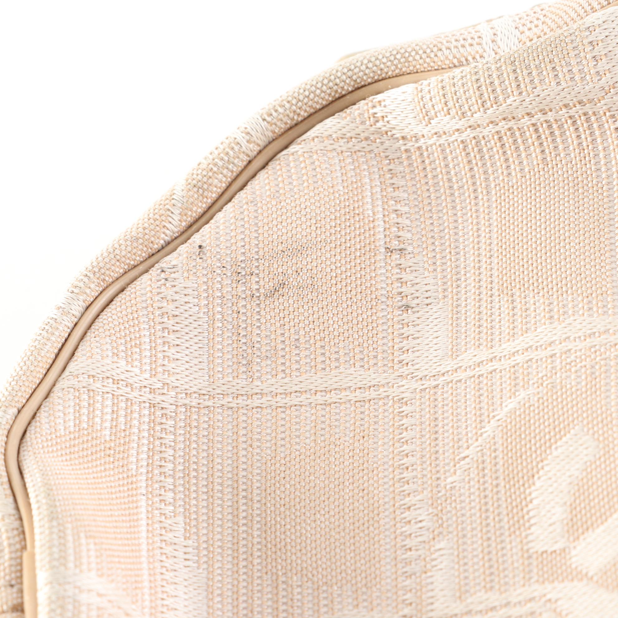 Chanel Travel Line Round Wristlet Pouch in CC Nylon Jacquard with Leather Trim