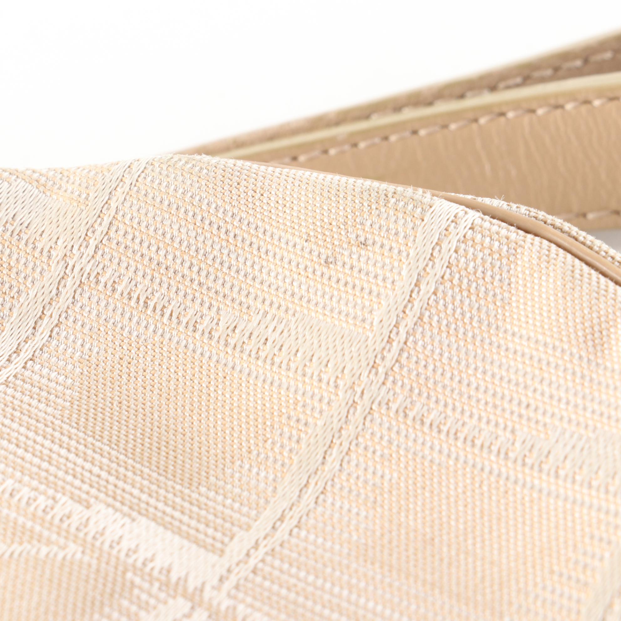 Chanel Travel Line Round Wristlet Pouch in CC Nylon Jacquard with Leather Trim