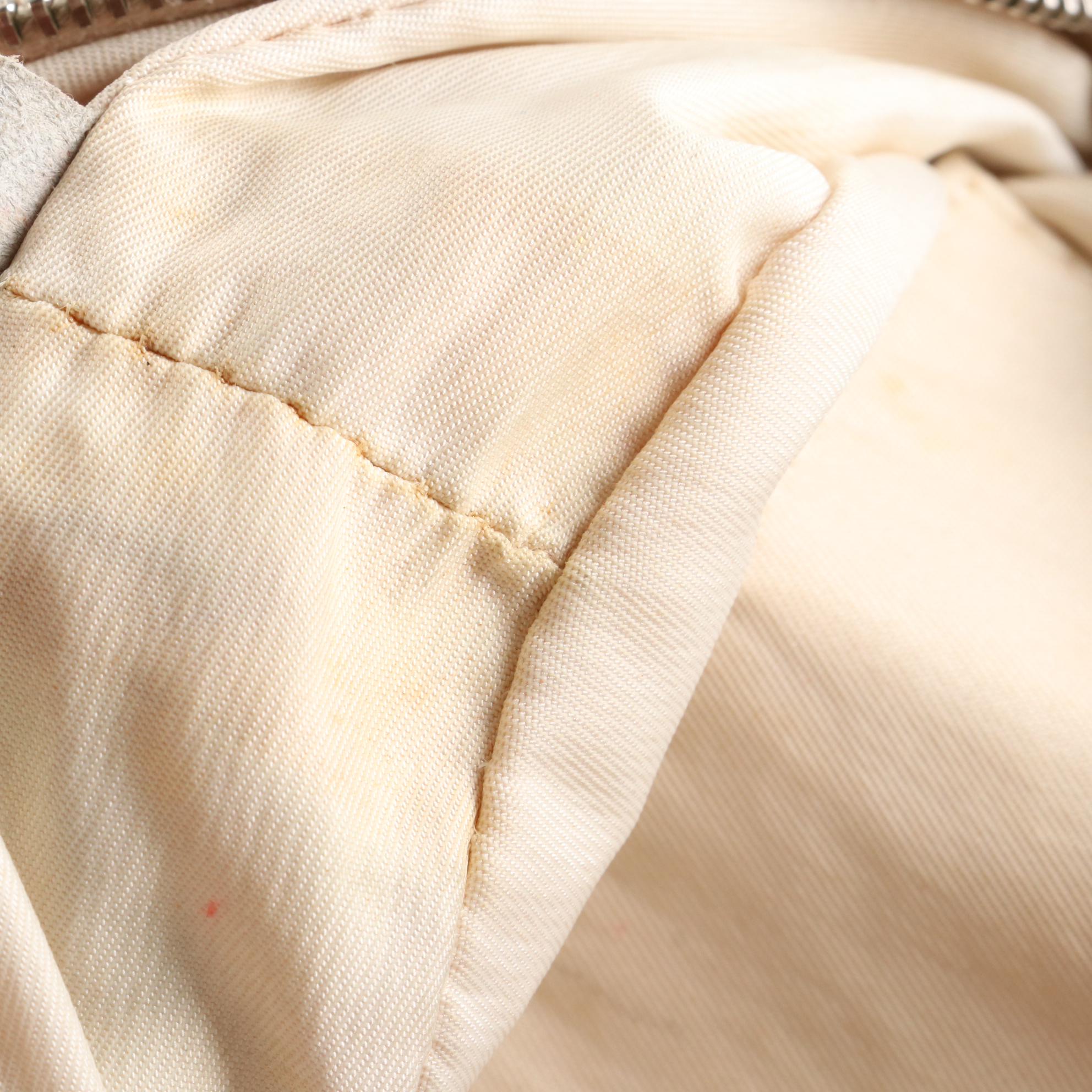 Chanel Travel Line Round Wristlet Pouch in CC Nylon Jacquard with Leather Trim