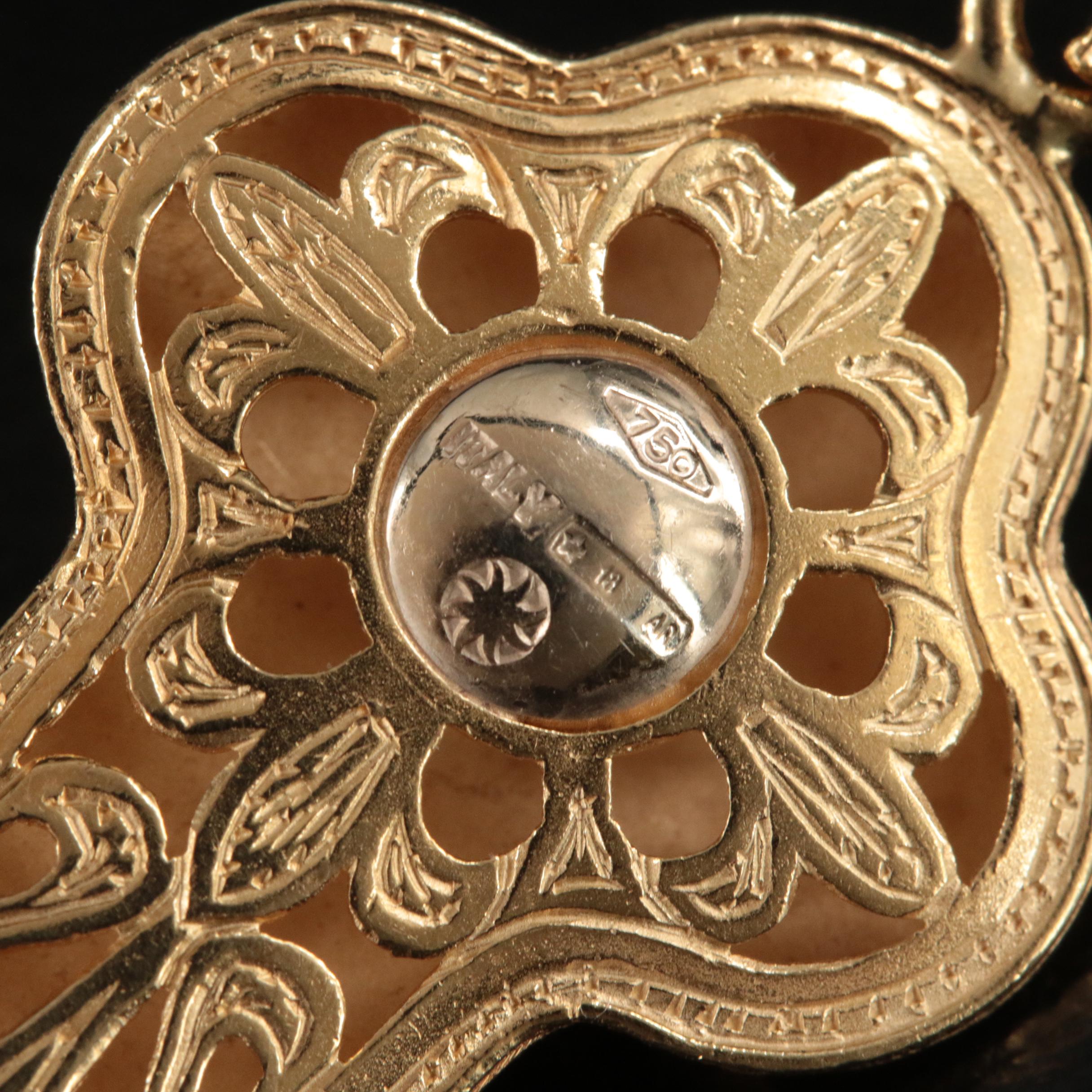 Italian 18K Garnet Cross Pendant with Scroll Detail