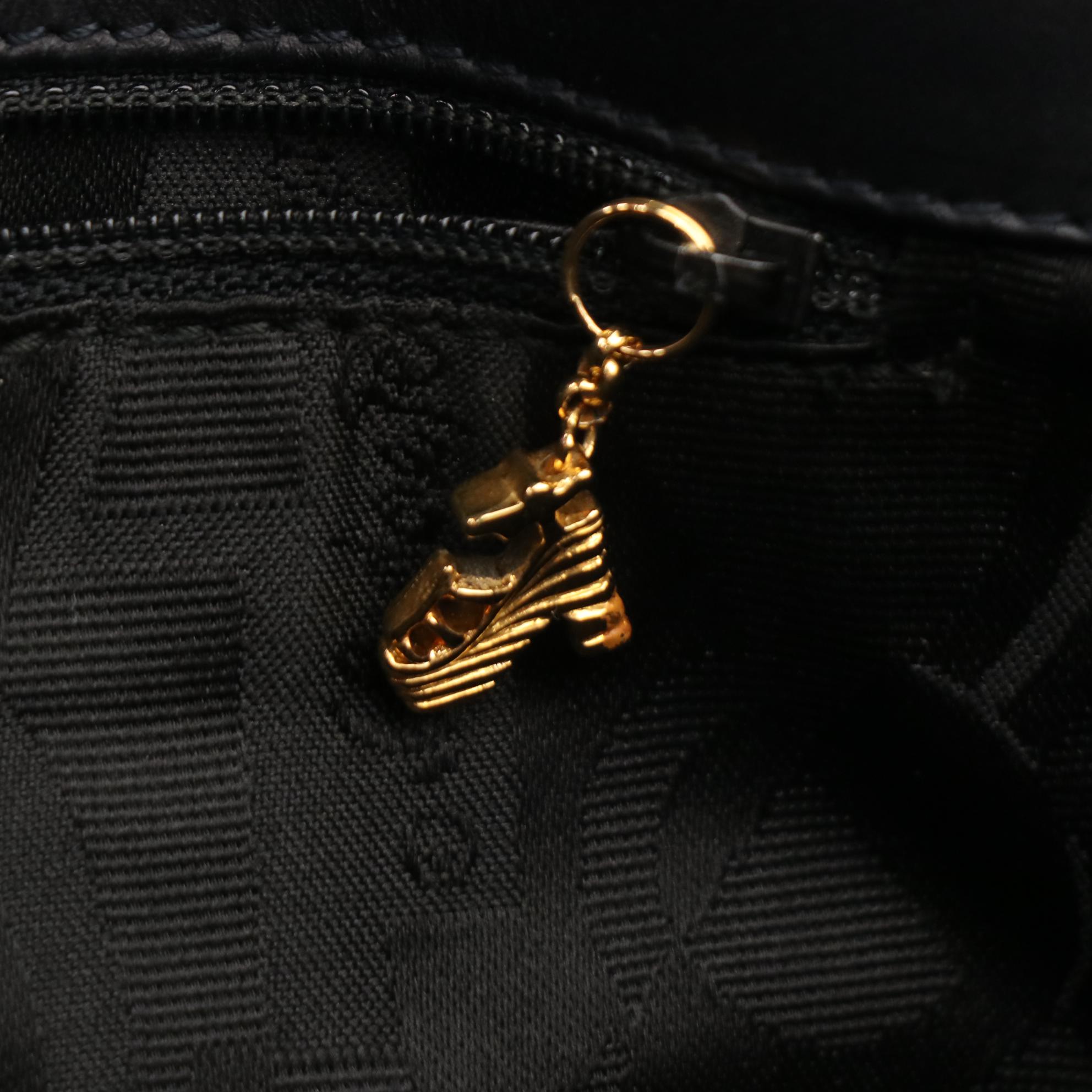 Salvatore Ferragamo Shoulder Bag with High Heel Motif Hardware in Navy Leather