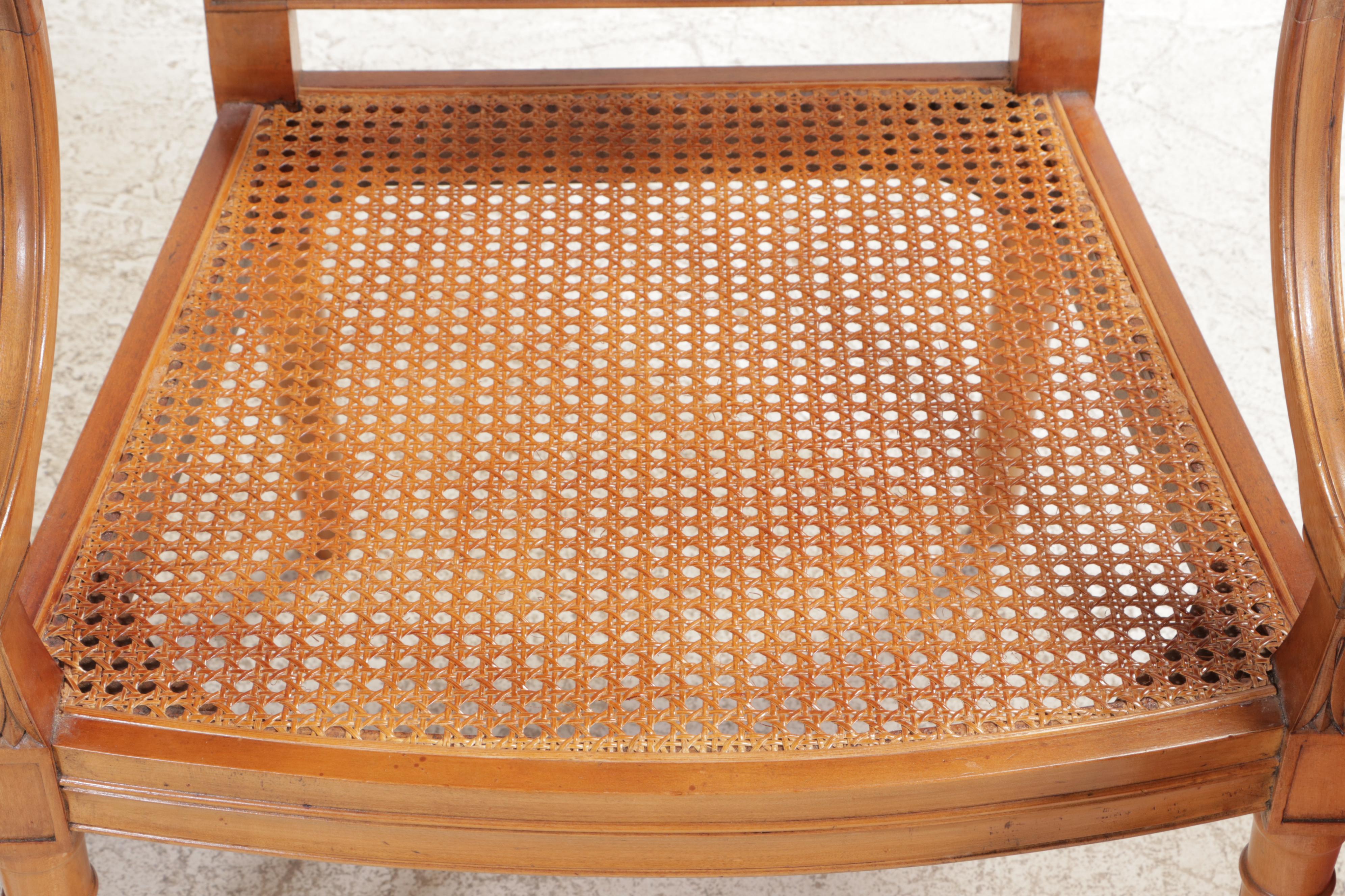 Pair of Louis XVI Style Fruitwood-Stained, Custom-Upholstered, & Caned Fauteuils