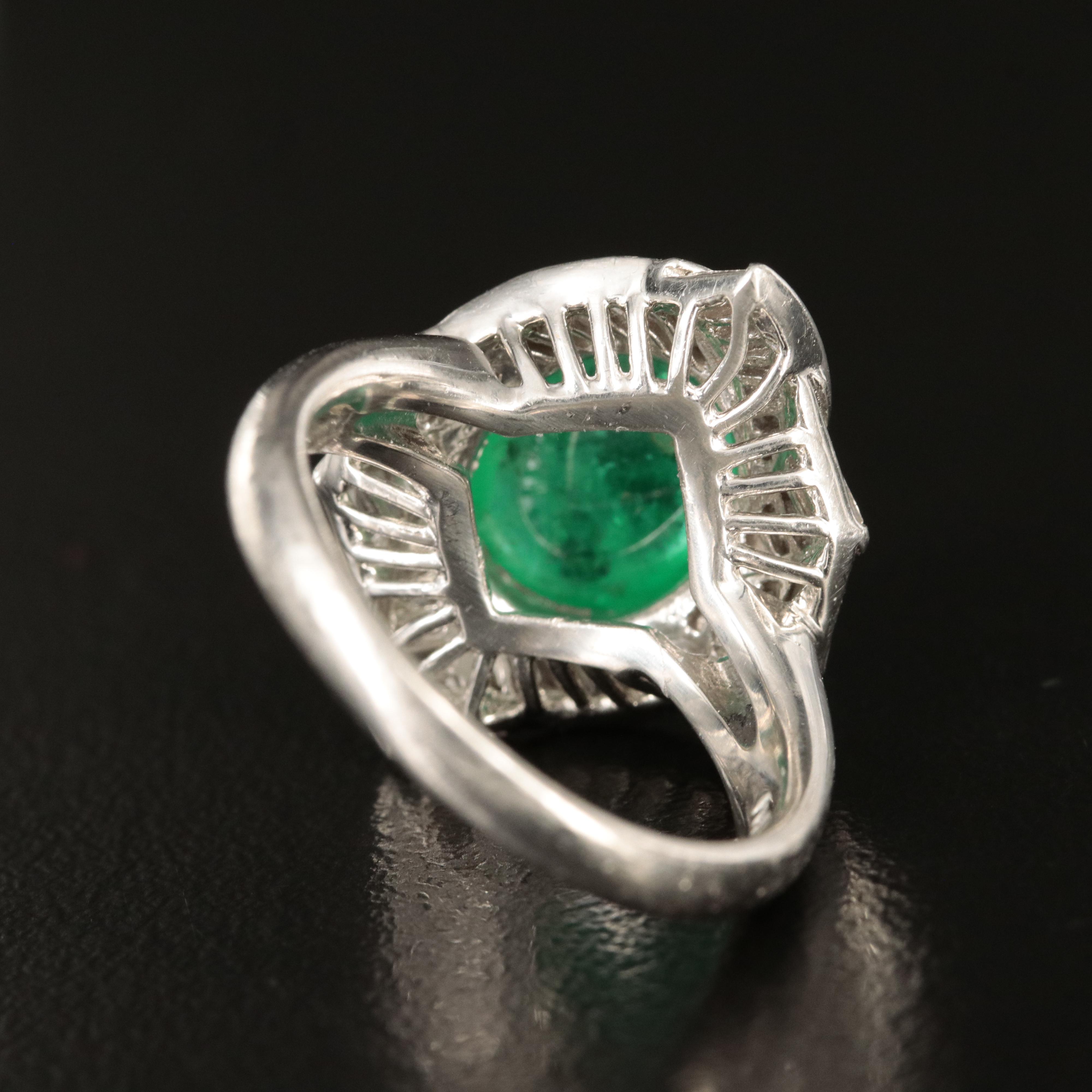 Platinum 4.24 CT Emerald and Diamond Ring with GIA Report