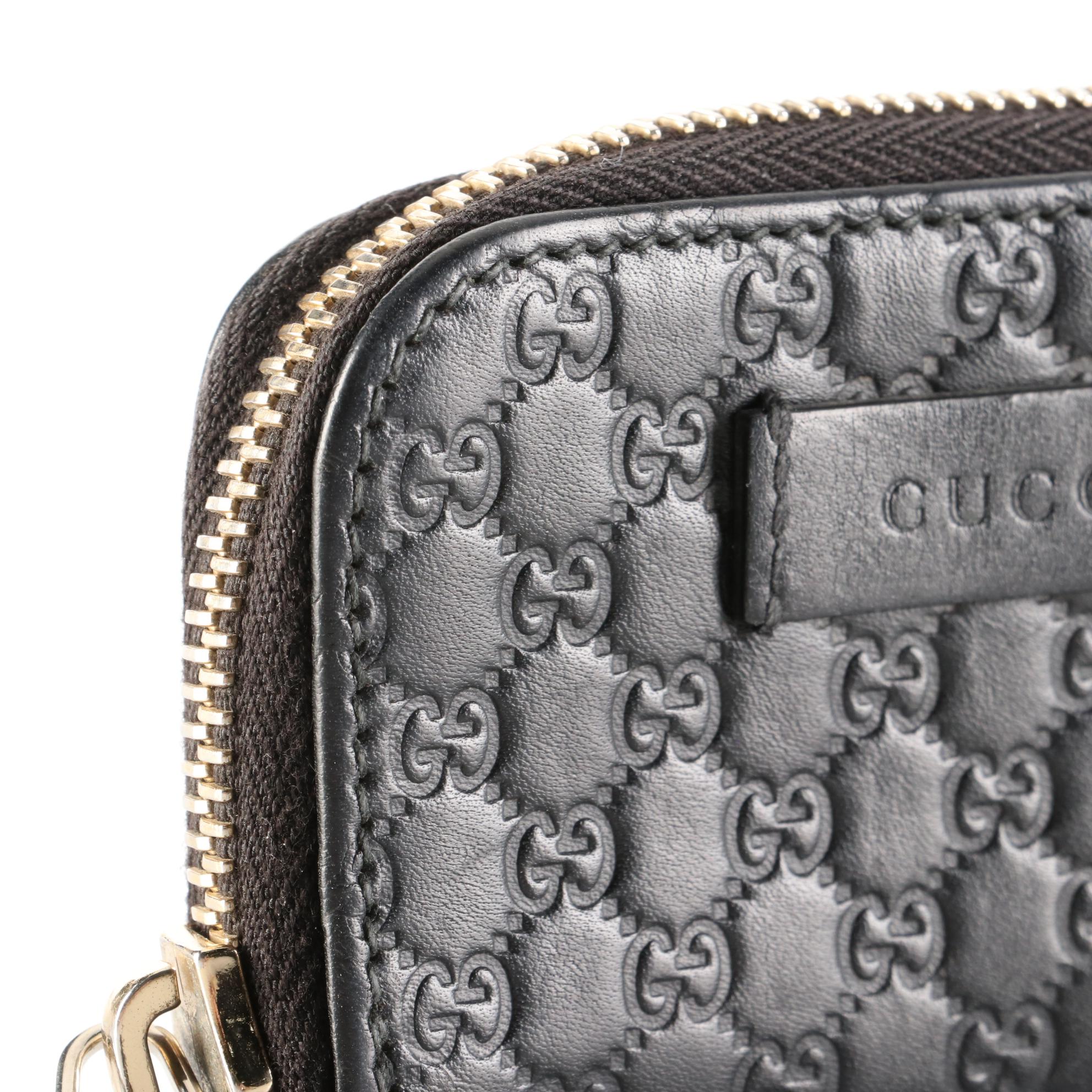 Gucci Zip-Around Coin Pouch in Black Microguccissima Leather