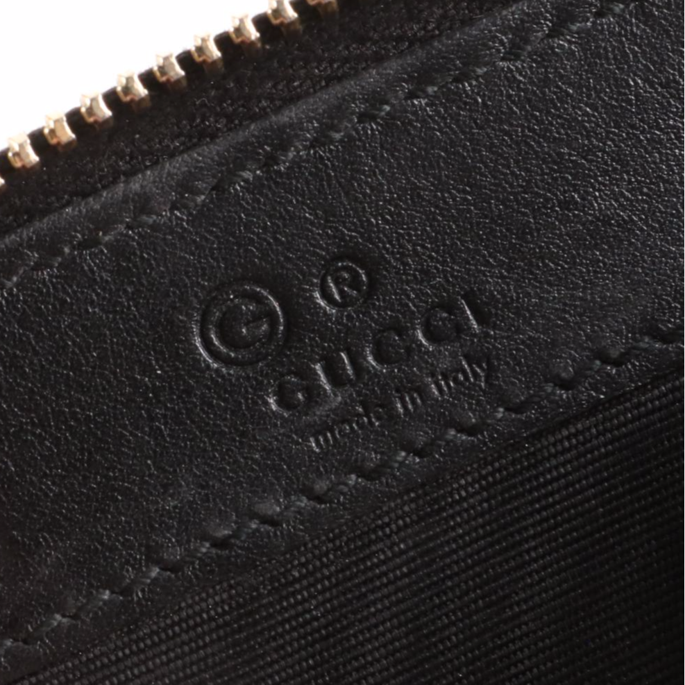 Gucci Zip-Around Coin Pouch in Black Microguccissima Leather