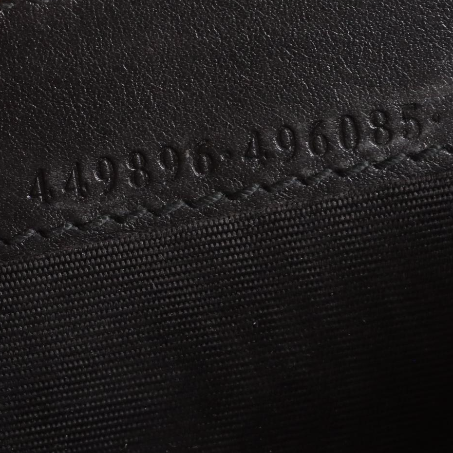 Gucci Zip-Around Coin Pouch in Black Microguccissima Leather