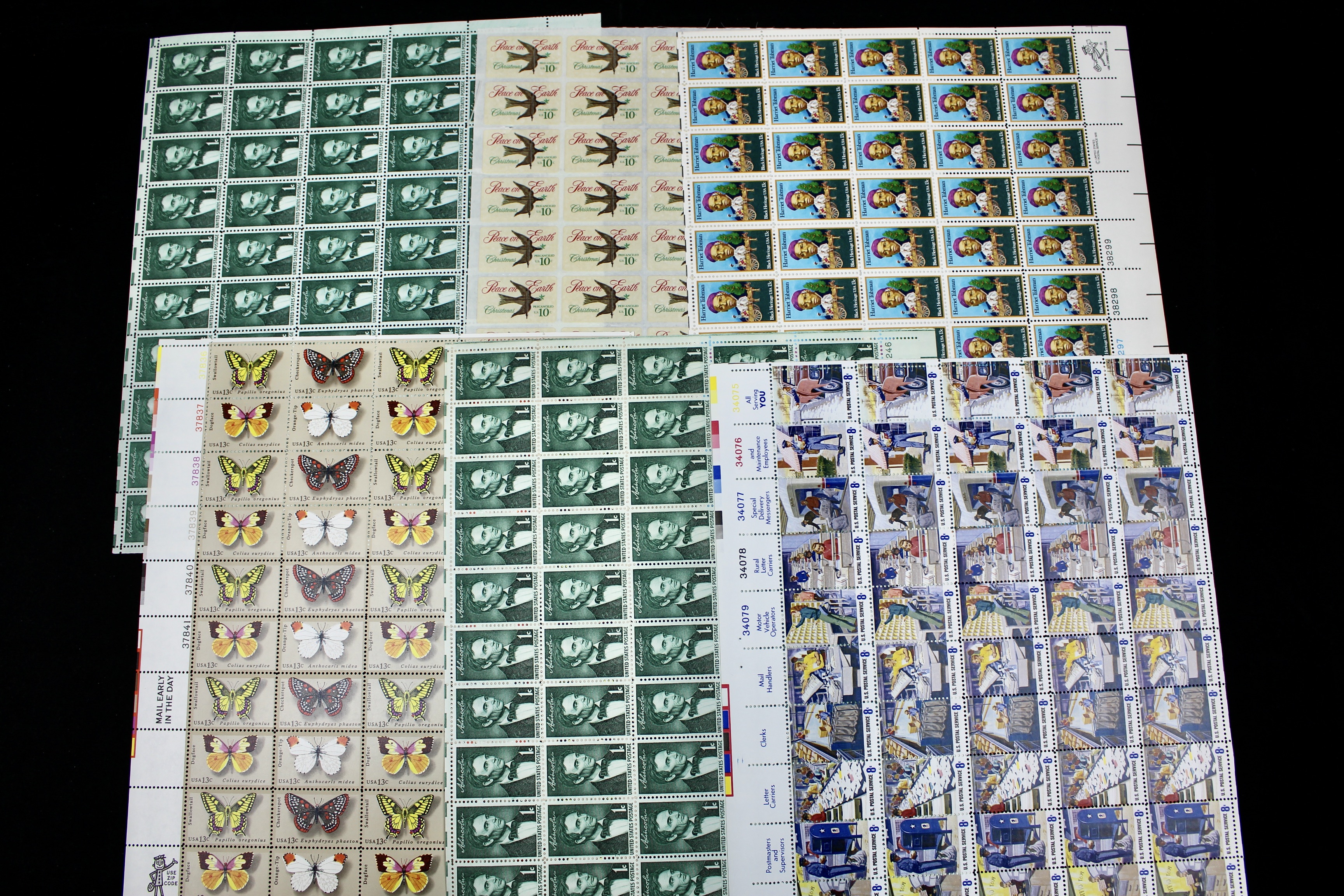 Twenty-Two Various Denominations of U.S. Postage Stamp Sheets