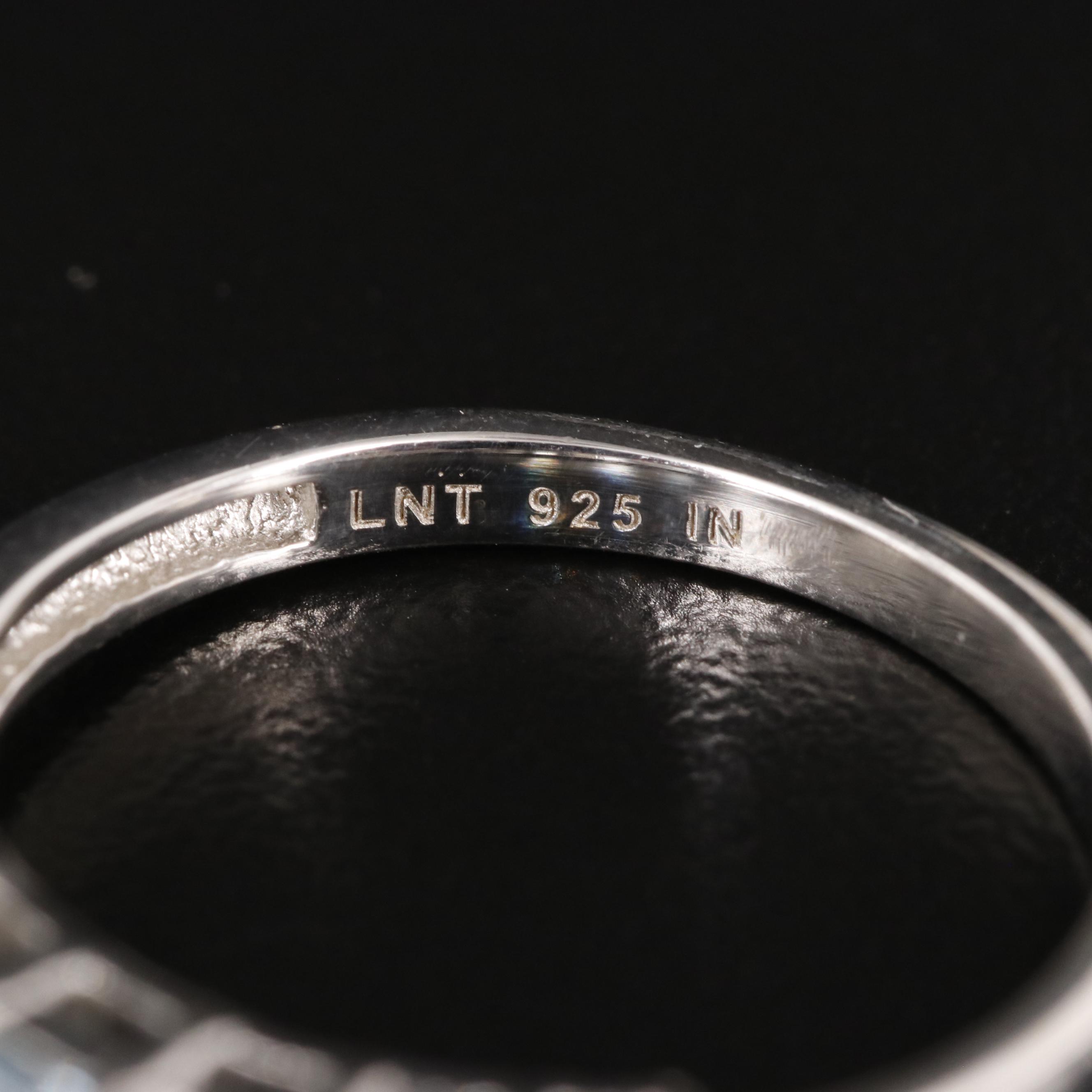 Sterling Blue and White Topaz Band