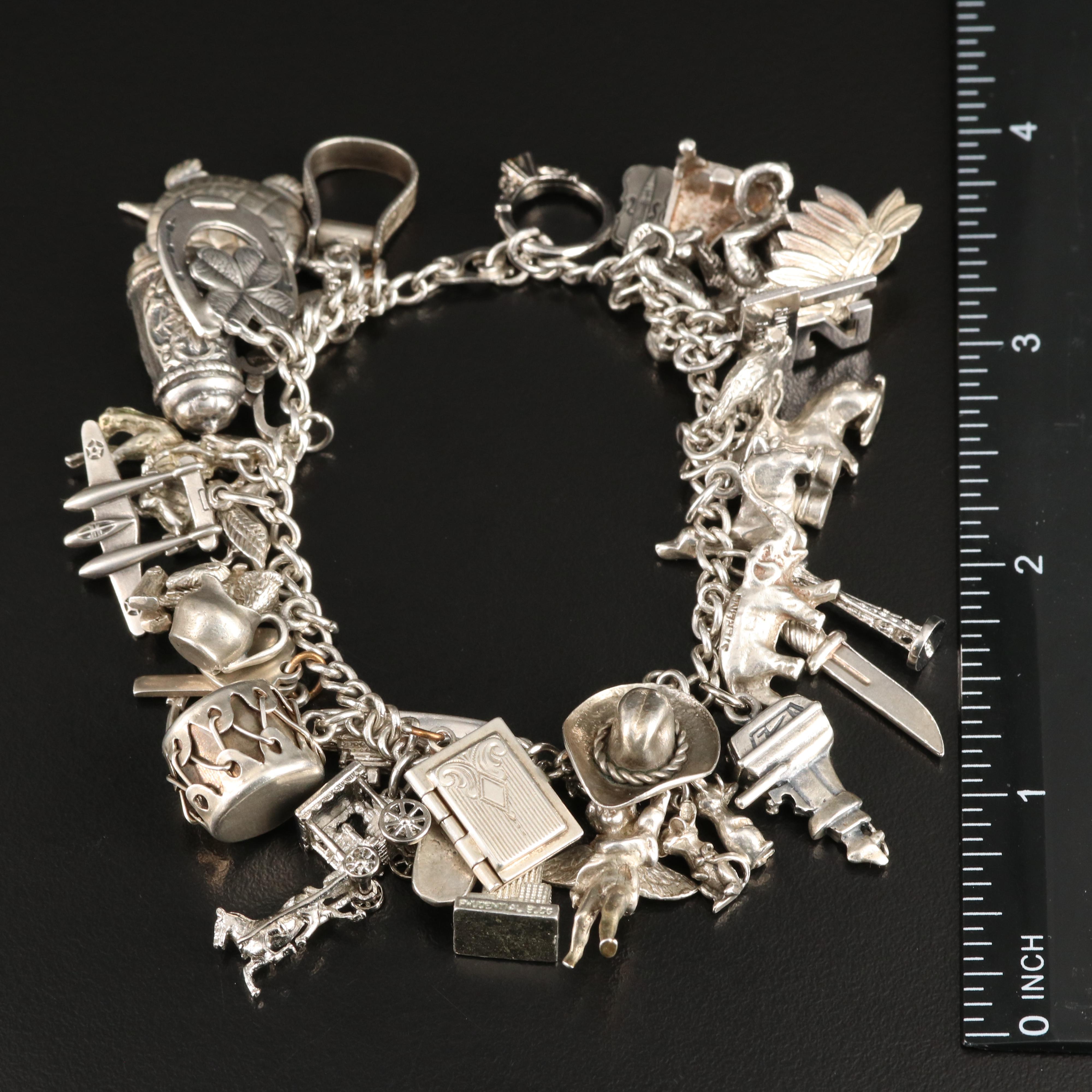 Vintage Sterling Charm Bracelet Including 800 Silver and Articulated Charms