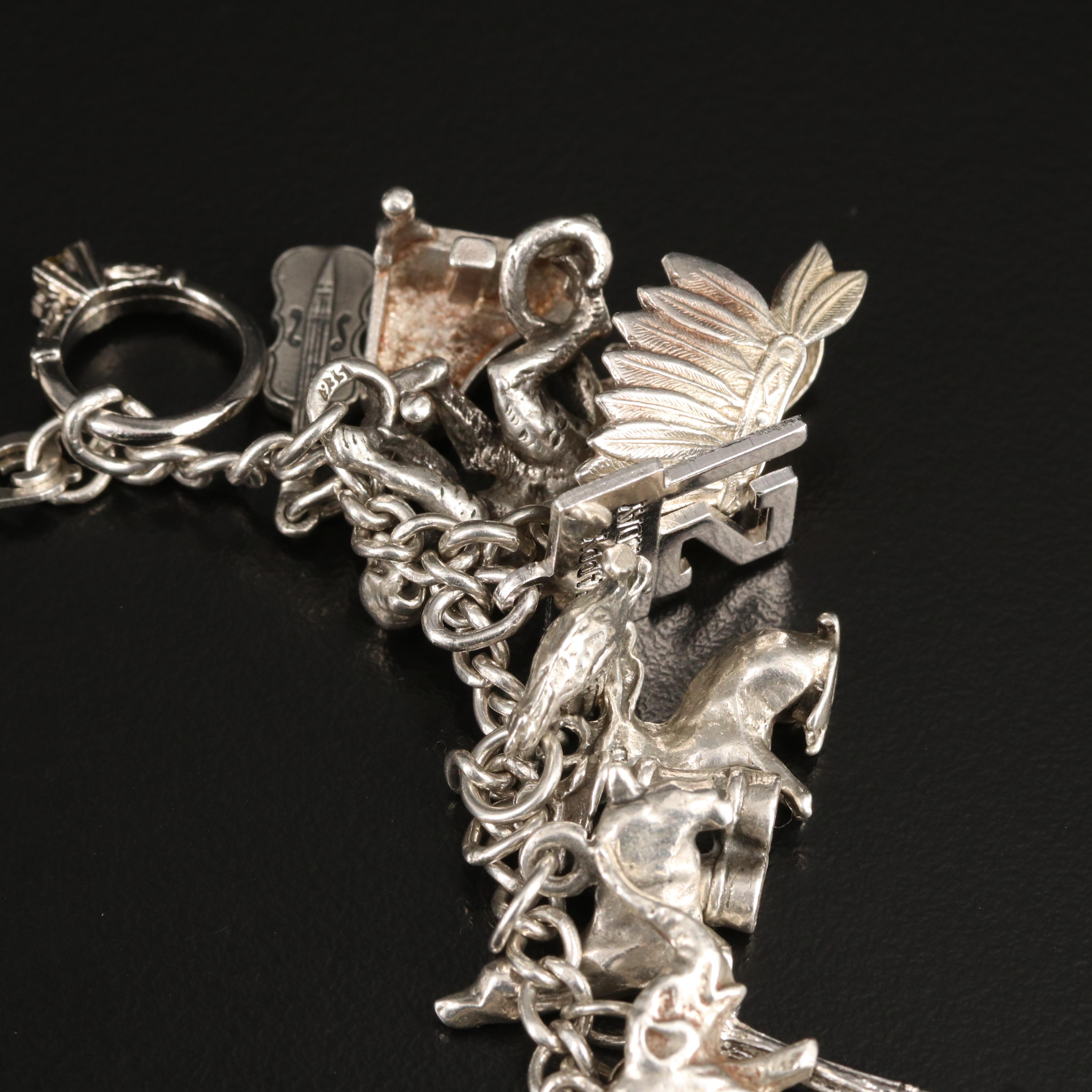 Vintage Sterling Charm Bracelet Including 800 Silver and Articulated Charms