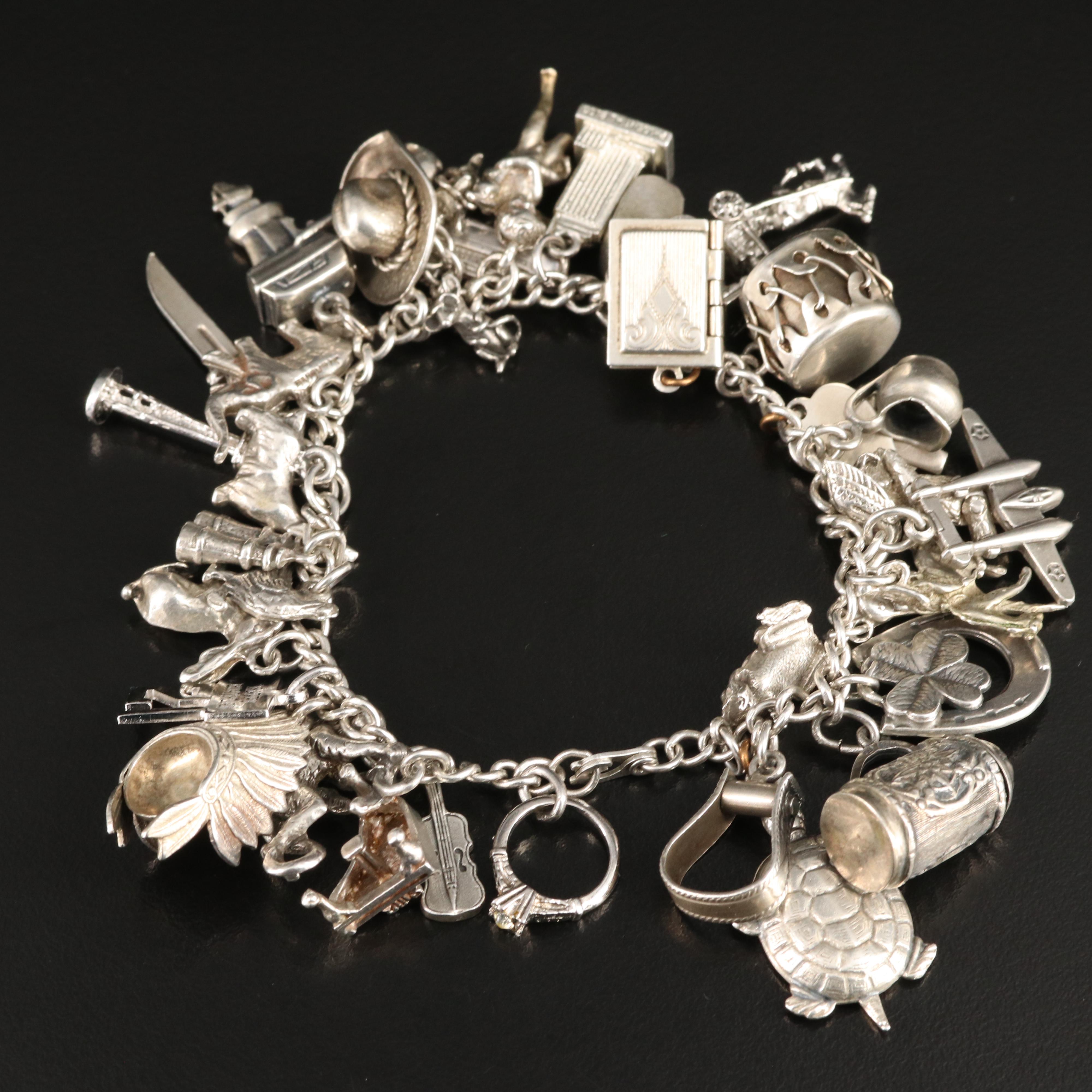 Vintage Sterling Charm Bracelet Including 800 Silver and Articulated Charms