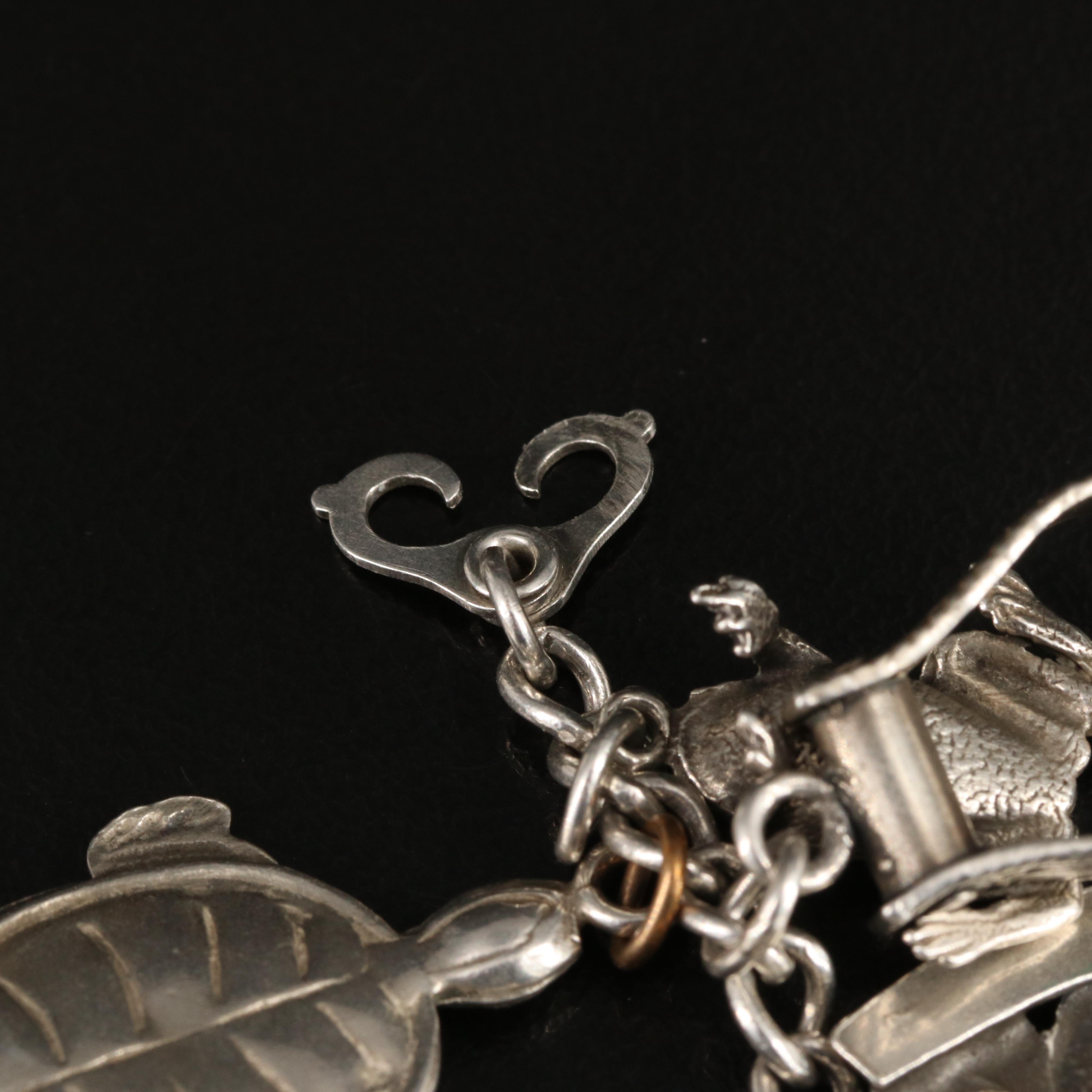 Vintage Sterling Charm Bracelet Including 800 Silver and Articulated Charms