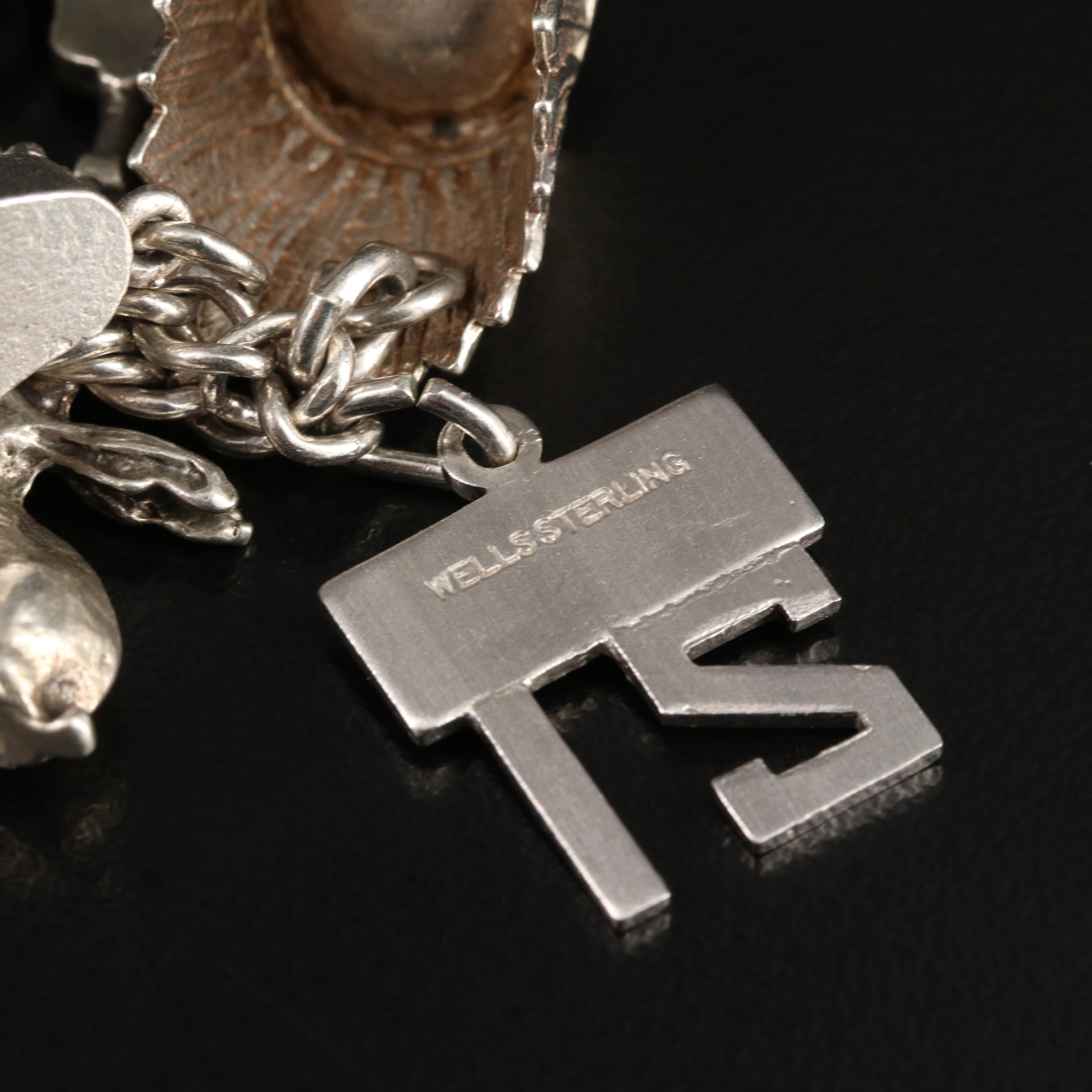 Vintage Sterling Charm Bracelet Including 800 Silver and Articulated Charms