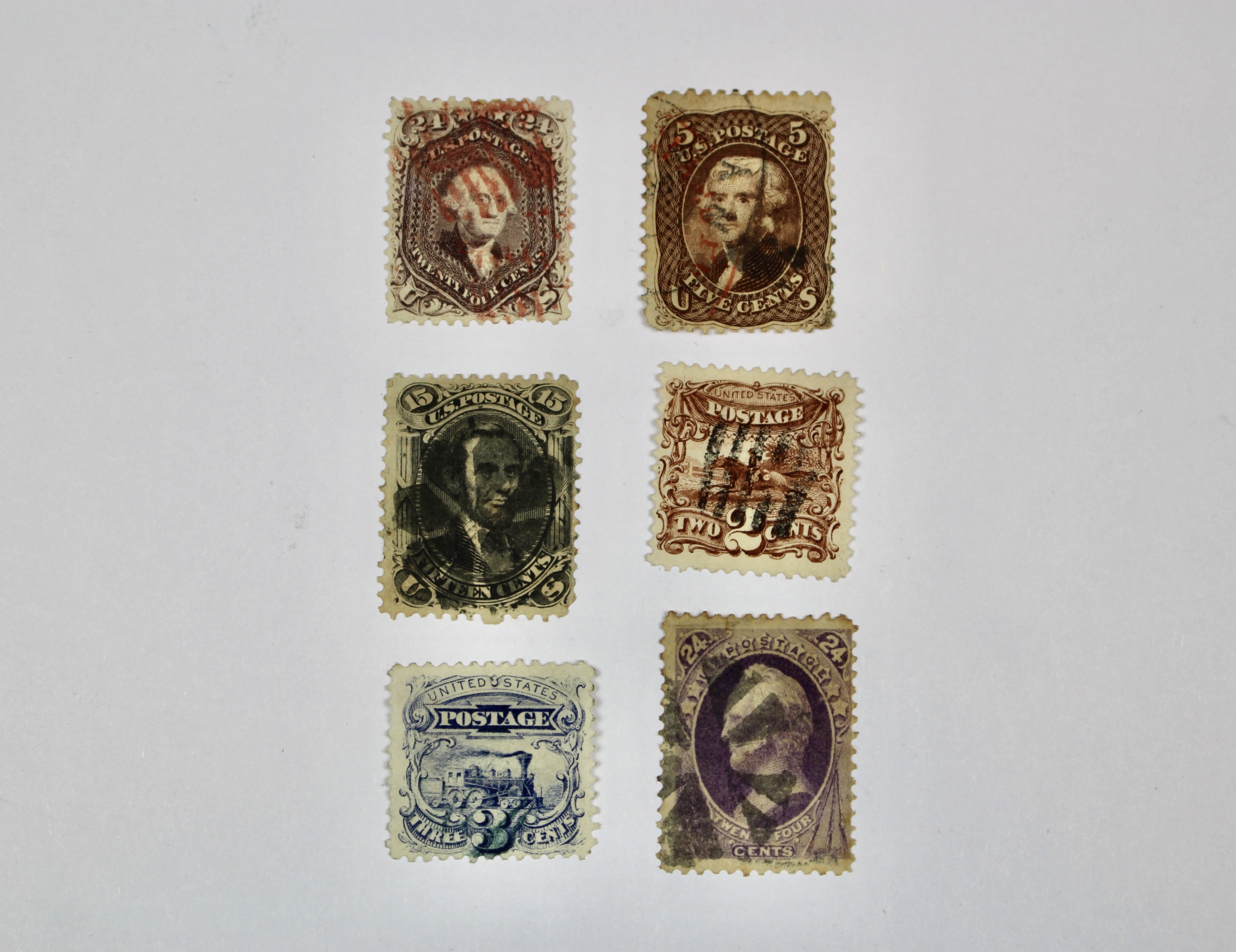 Six Early Used U.S. Postage Stamps