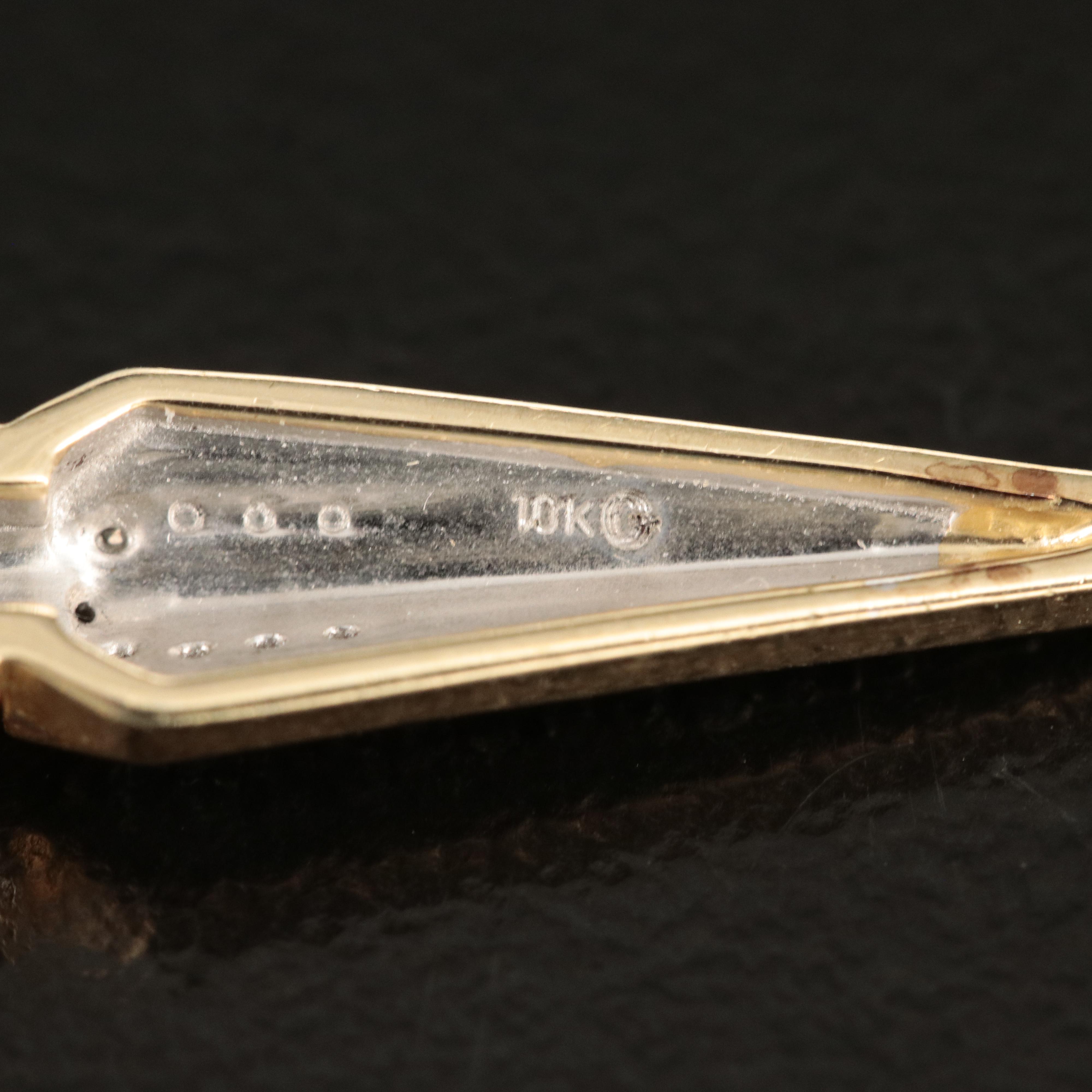 10K 0.23 CTW Diamond Winged Dagger Pendant