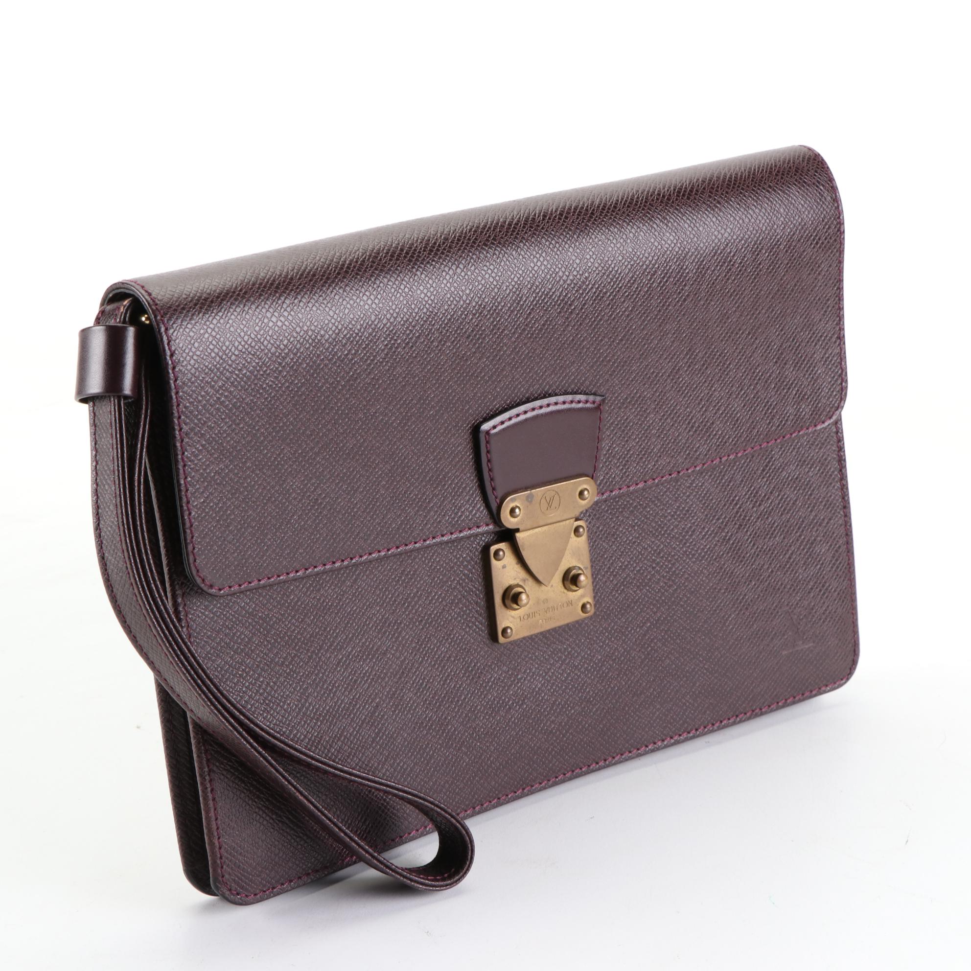 Louis Vuitton Kourad Clutch in Bordeaux Taïga Leather