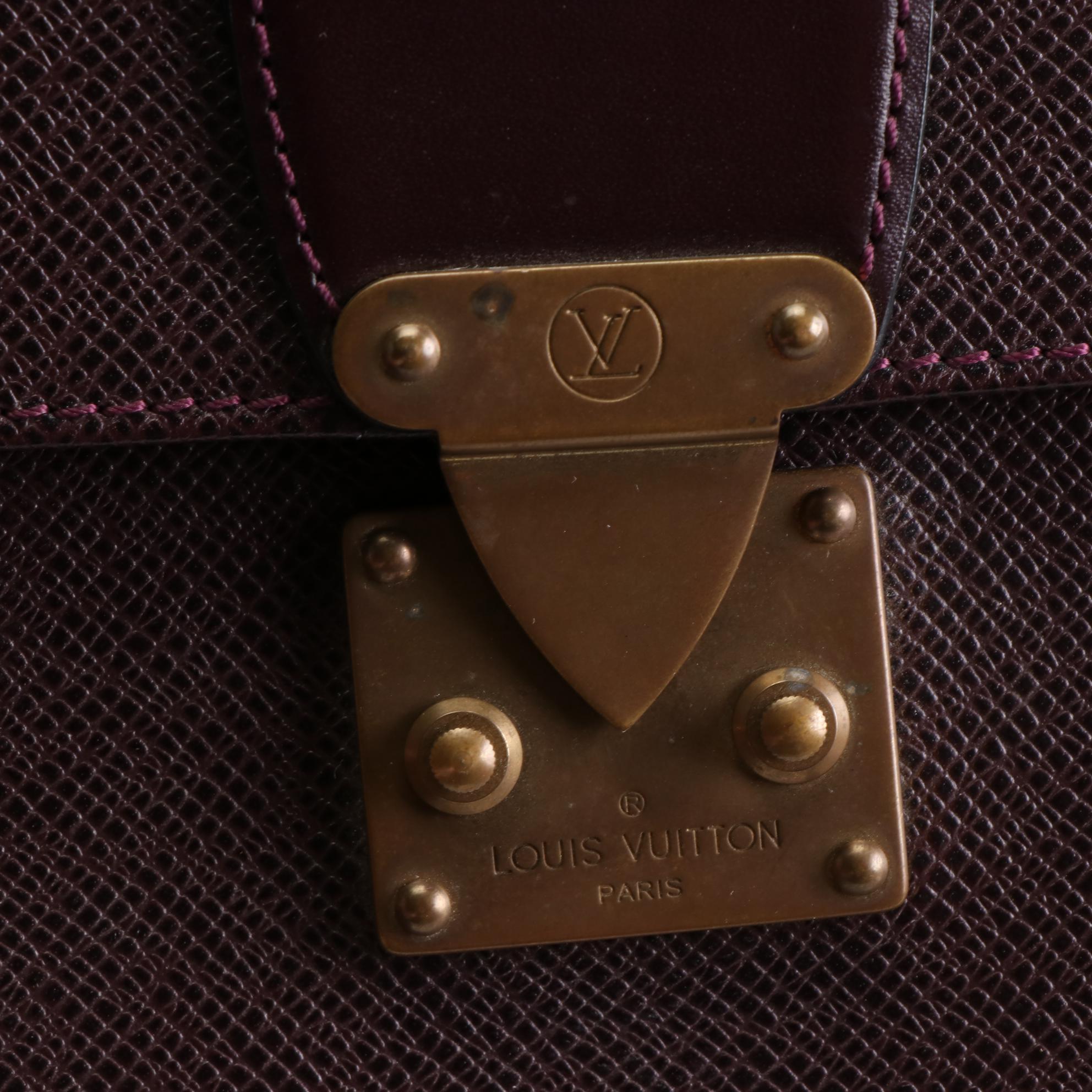 Louis Vuitton Kourad Clutch in Bordeaux Taïga Leather