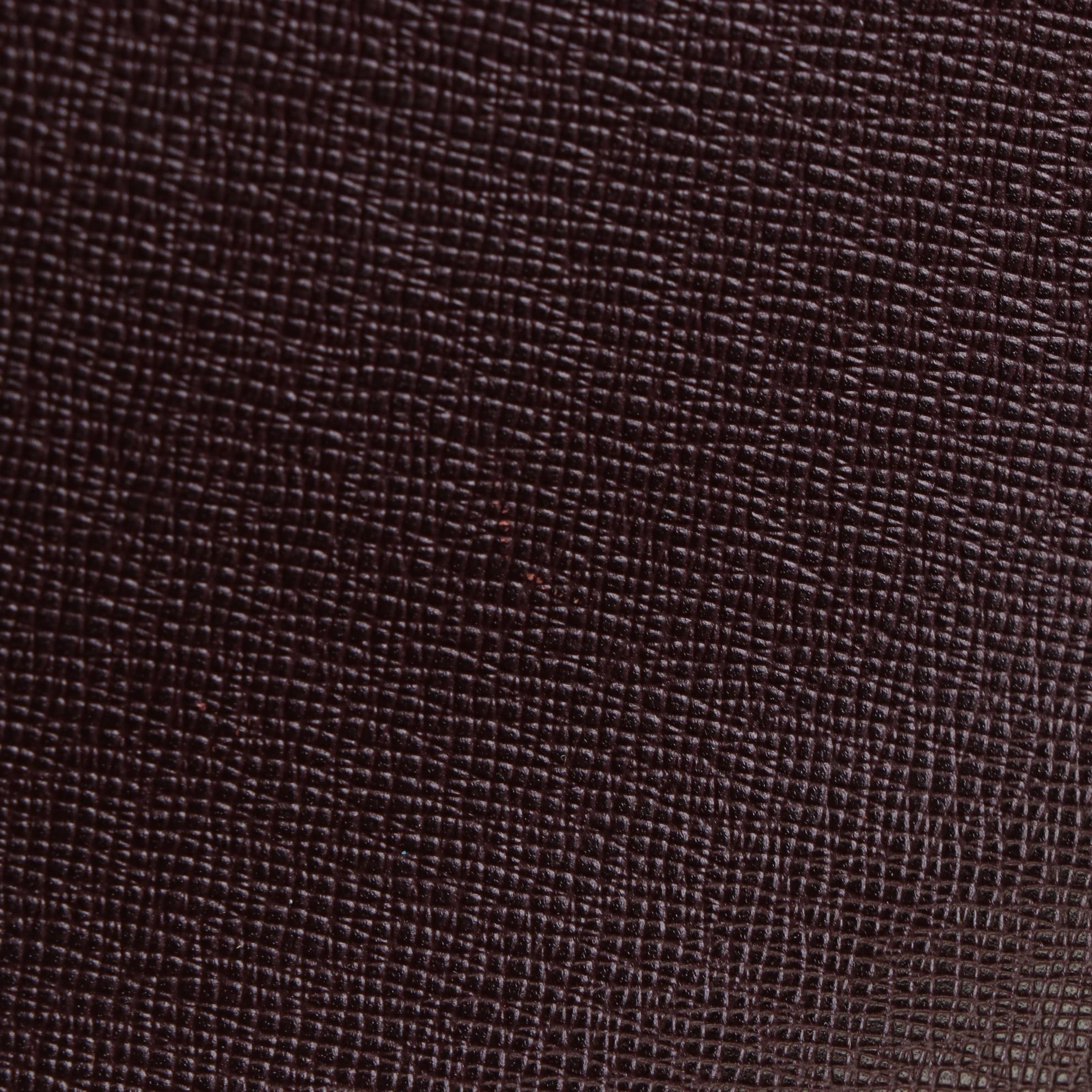 Louis Vuitton Kourad Clutch in Bordeaux Taïga Leather
