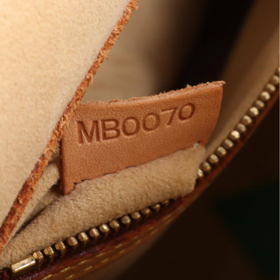 Louis Vuitton Babylone Tote in Monogram Canvas and Vachetta Leather