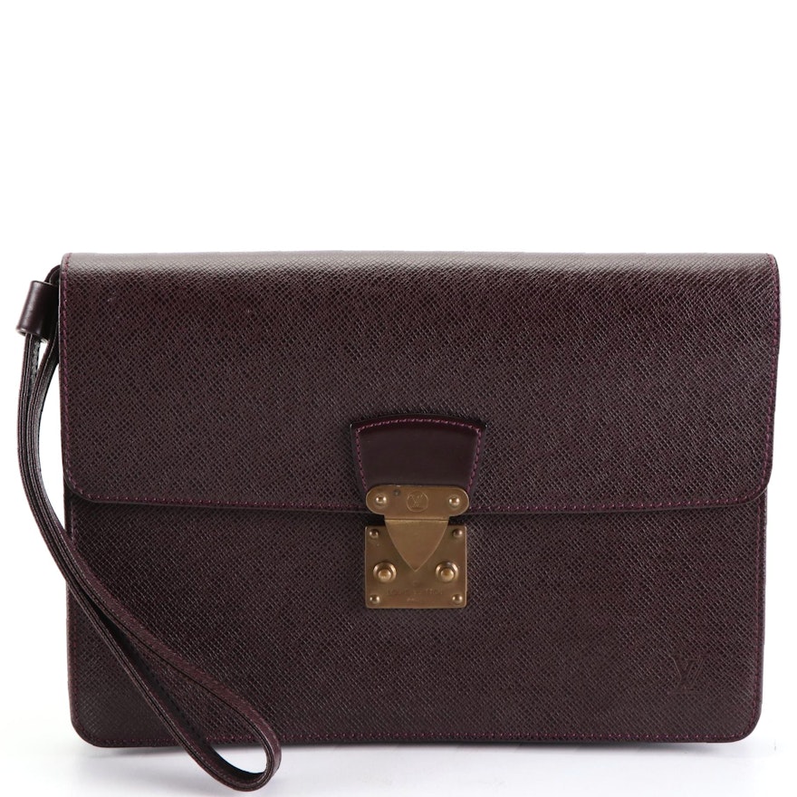 Louis Vuitton Kourad Clutch in Bordeaux Taïga Leather