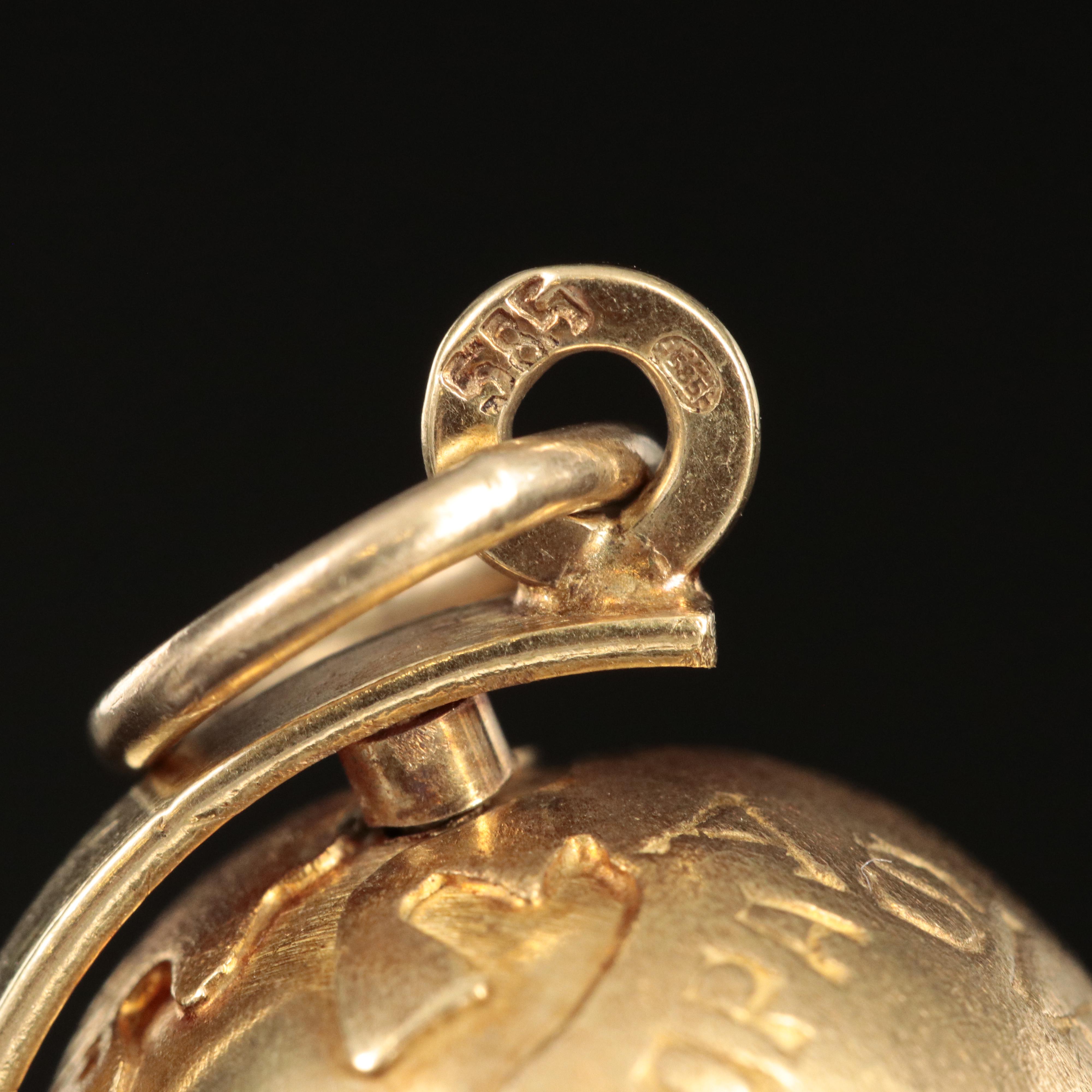 Vintage 14K Articulated Globe Pendant