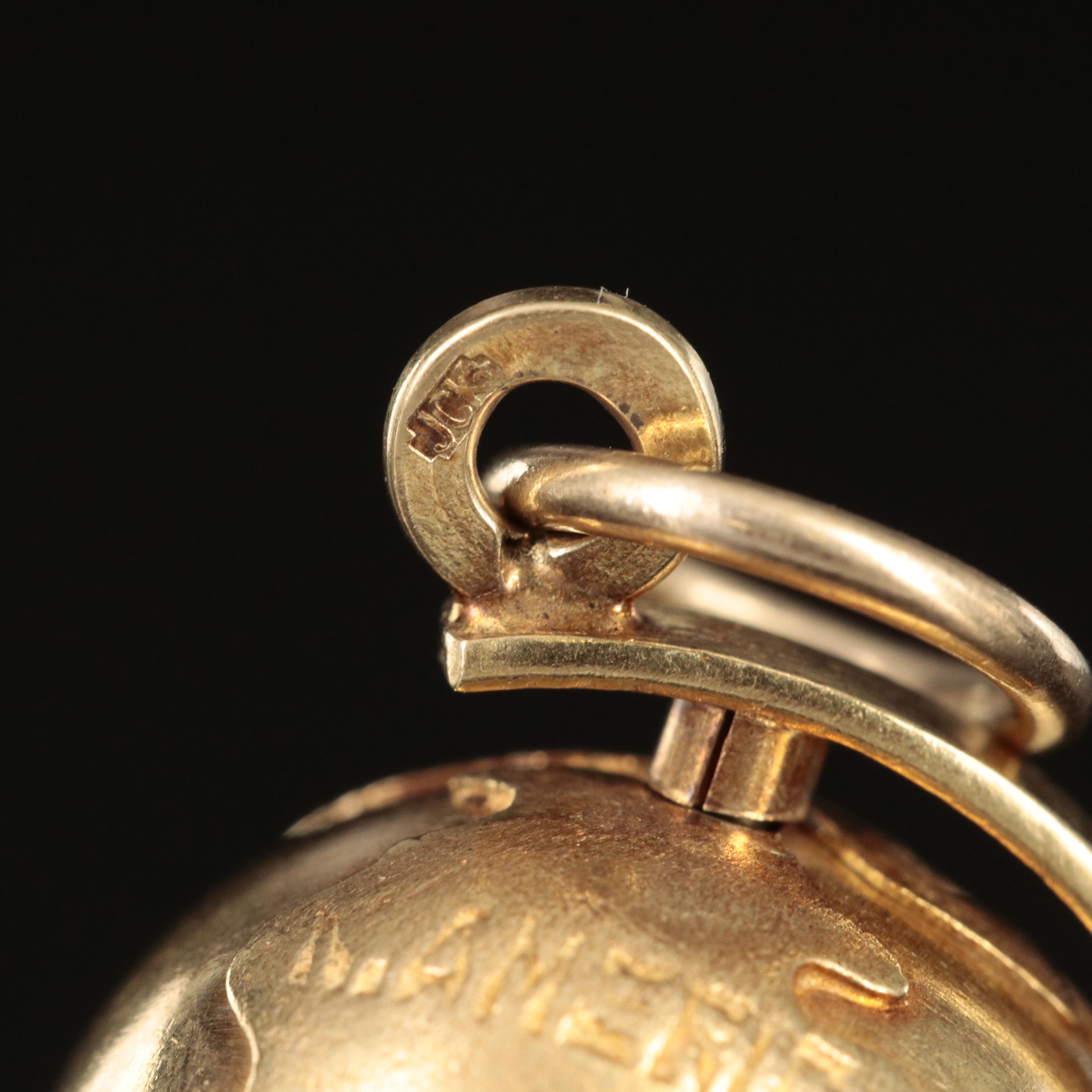 Vintage 14K Articulated Globe Pendant