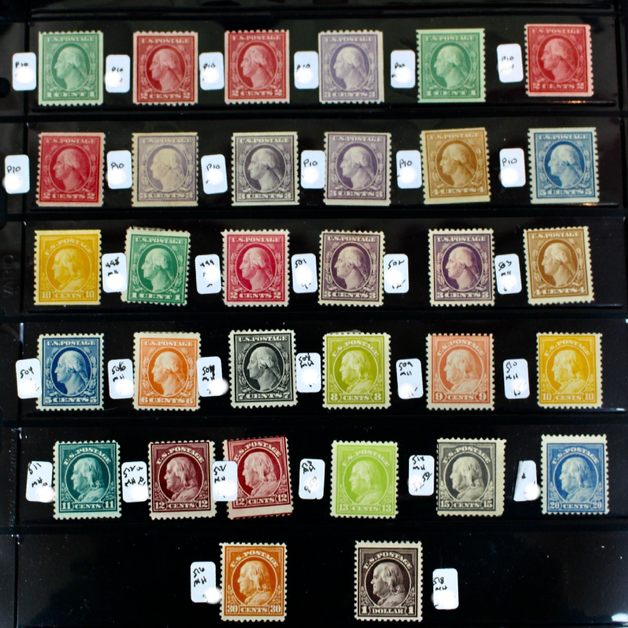 Thirty-Two Mint Hinged Washington and Franklin U.S. Postage Stamps