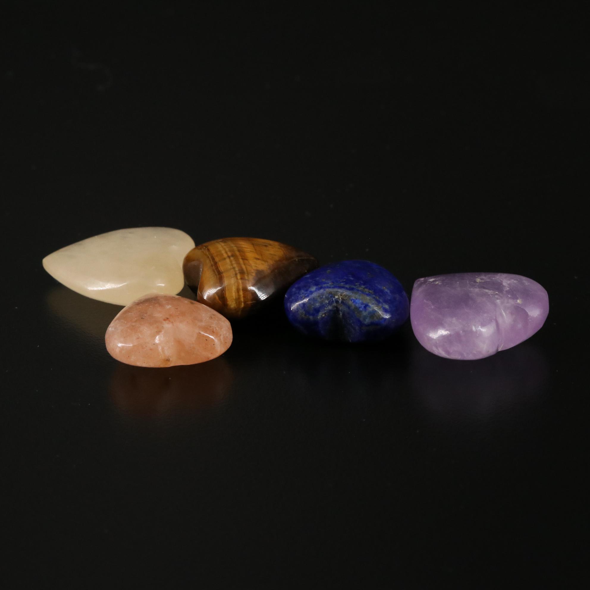 Carved and Polished Amethyst, Tiger's Eye, and Lapis Lazuli Hearts