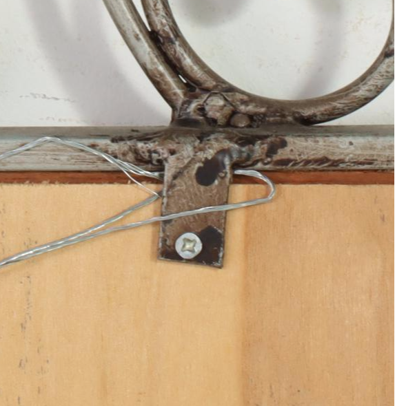 Patinated Metal and Wicker Wall Mirror