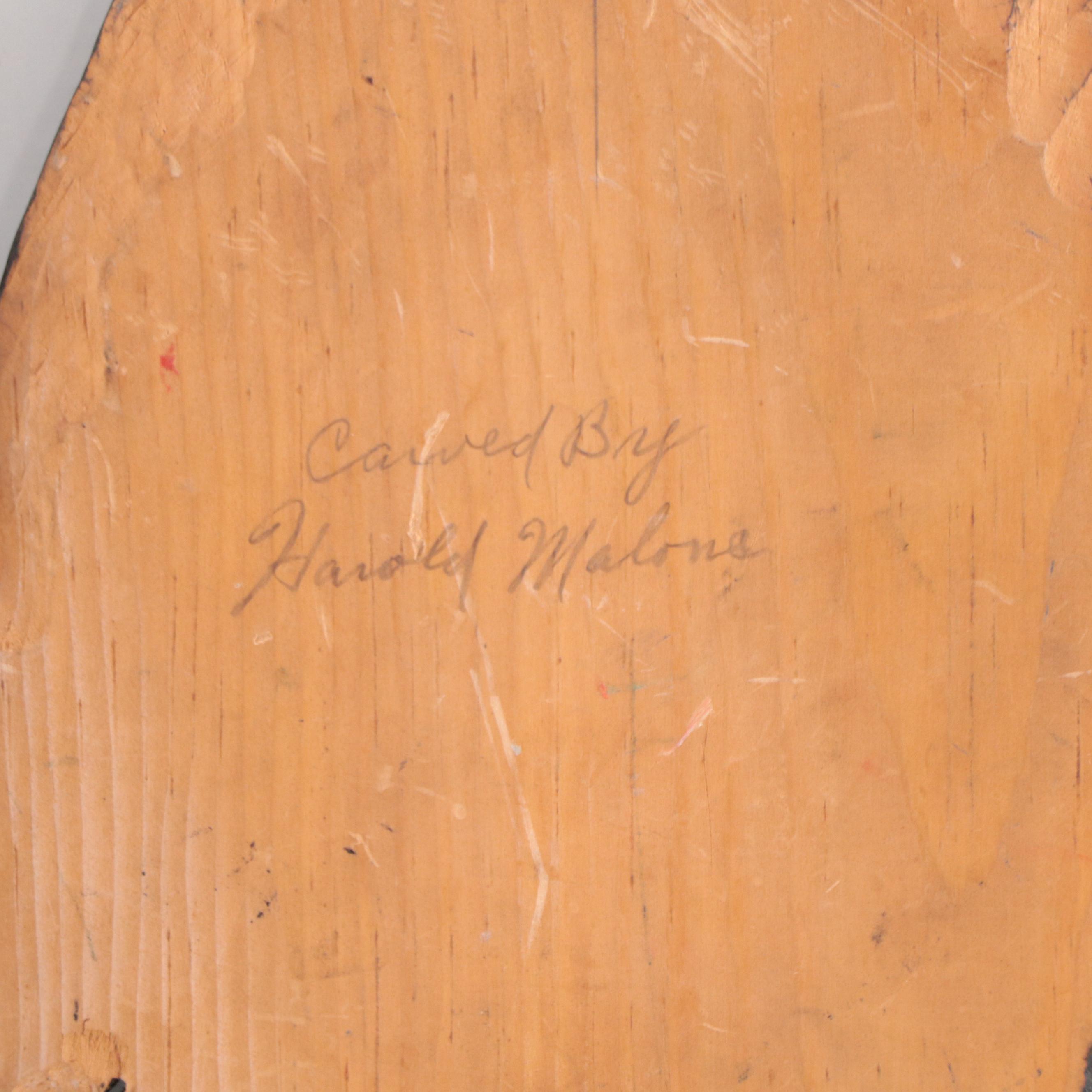 Offset Lithograph of Native American Figure In Winter Scene With Wood Carving