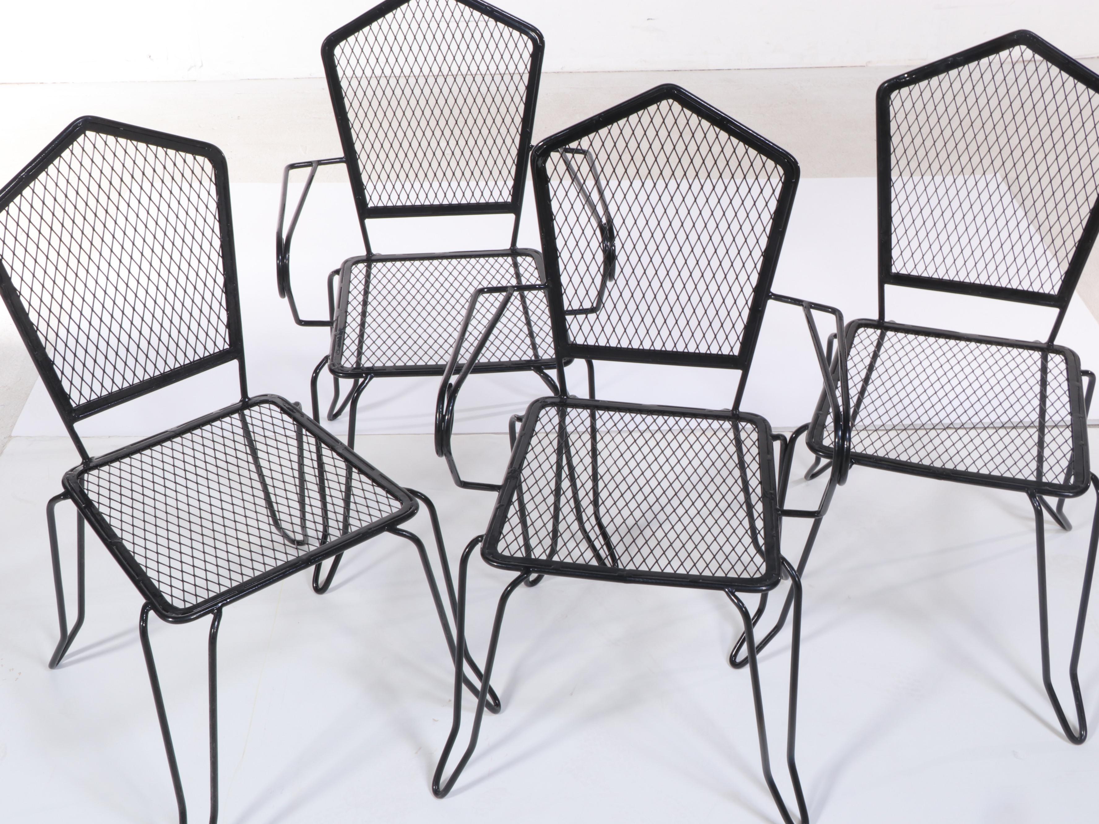Set of Four Black Painted Wrought Iron and Metal Mesh Patio Dining Chairs