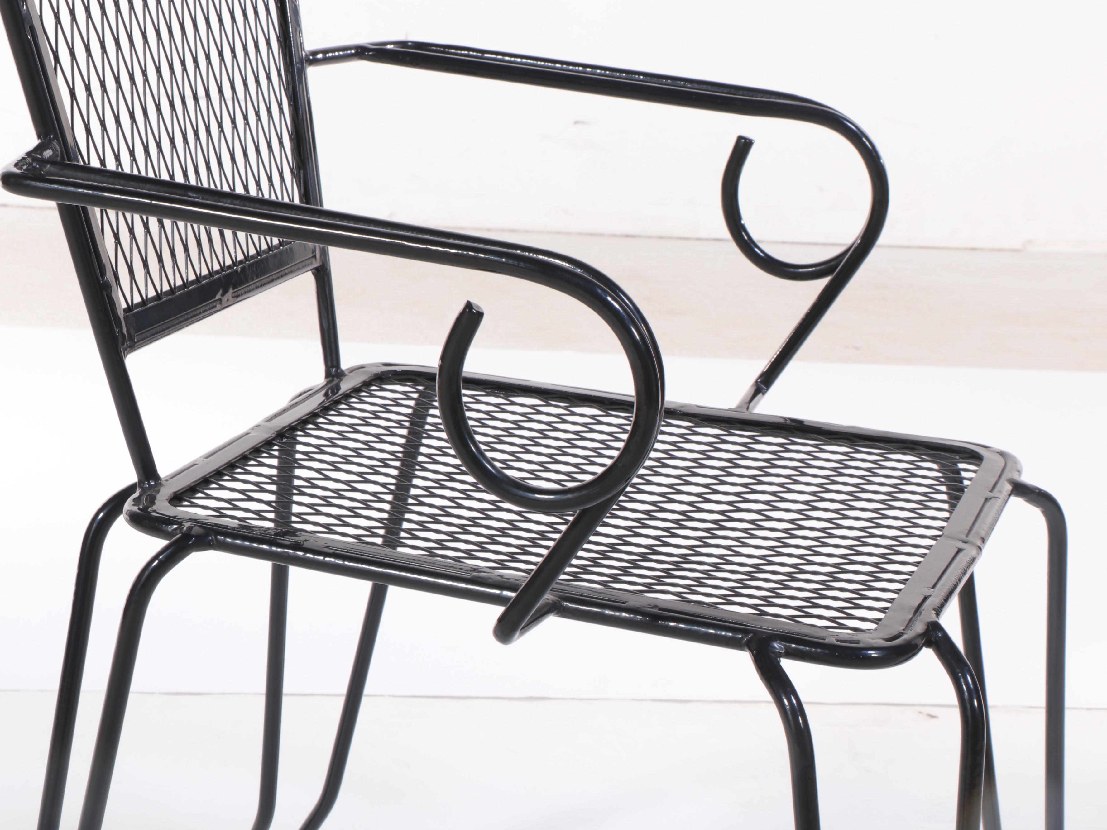 Set of Four Black Painted Wrought Iron and Metal Mesh Patio Dining Chairs