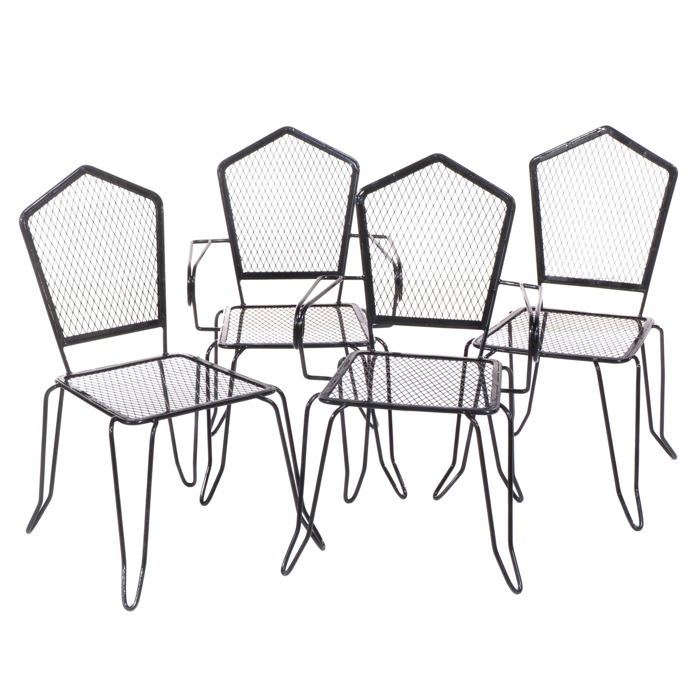 Set of Four Black Painted Wrought Iron and Metal Mesh Patio Dining Chairs
