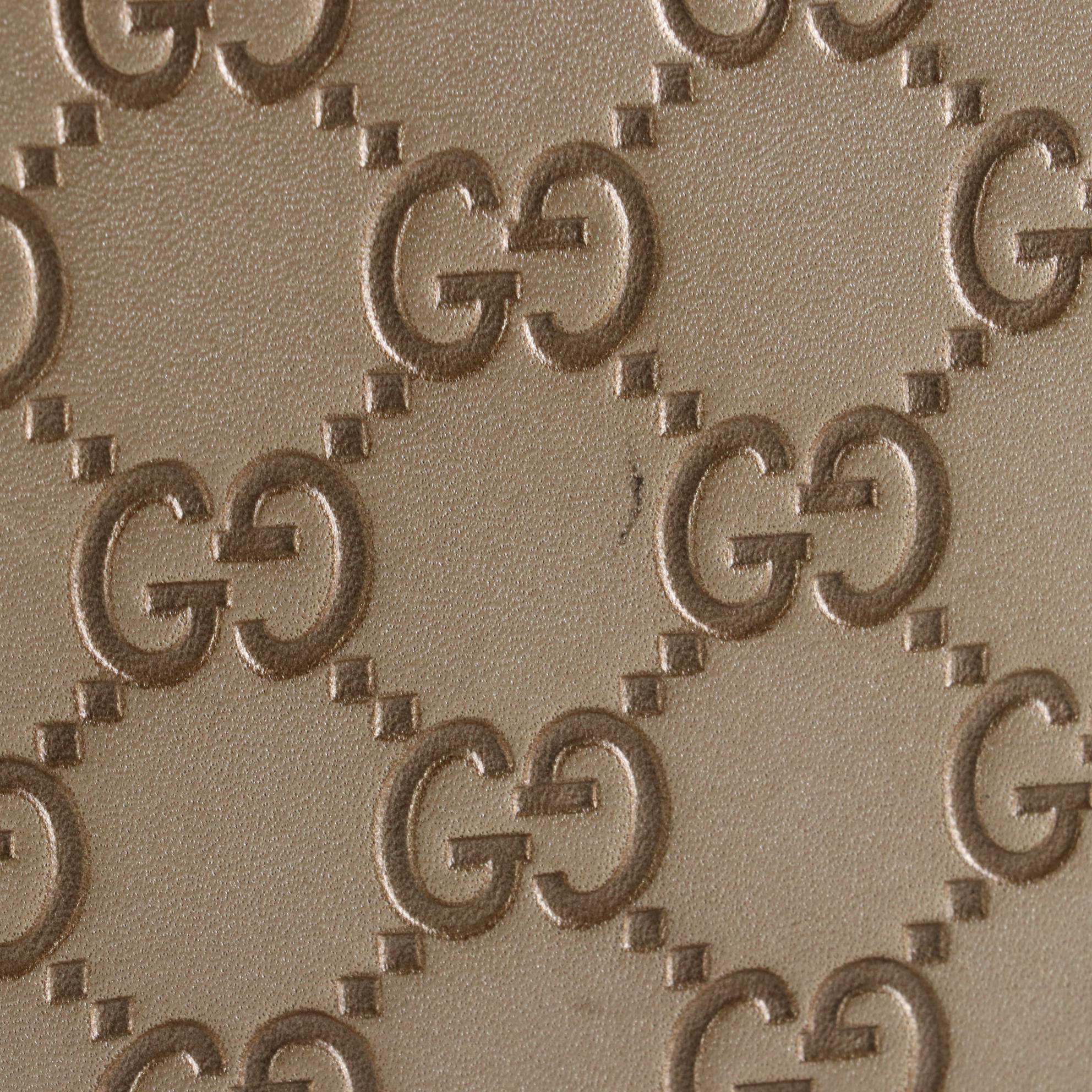 Gucci Emily Shoulder Bag with Tassels in Metallic Guccissima Leather