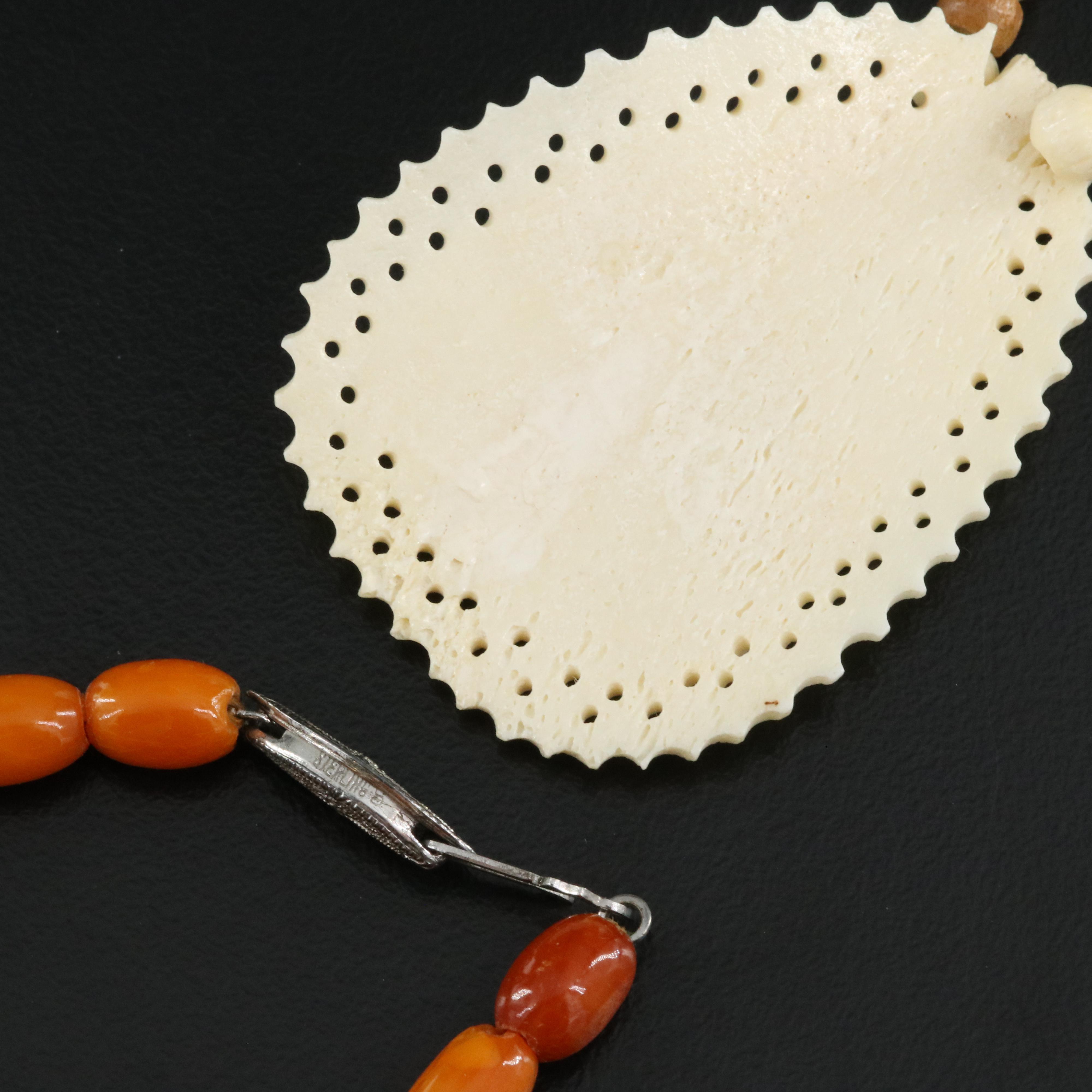 Graduated Amber, Carved Wood and Bone Necklaces with Sterling Clasps