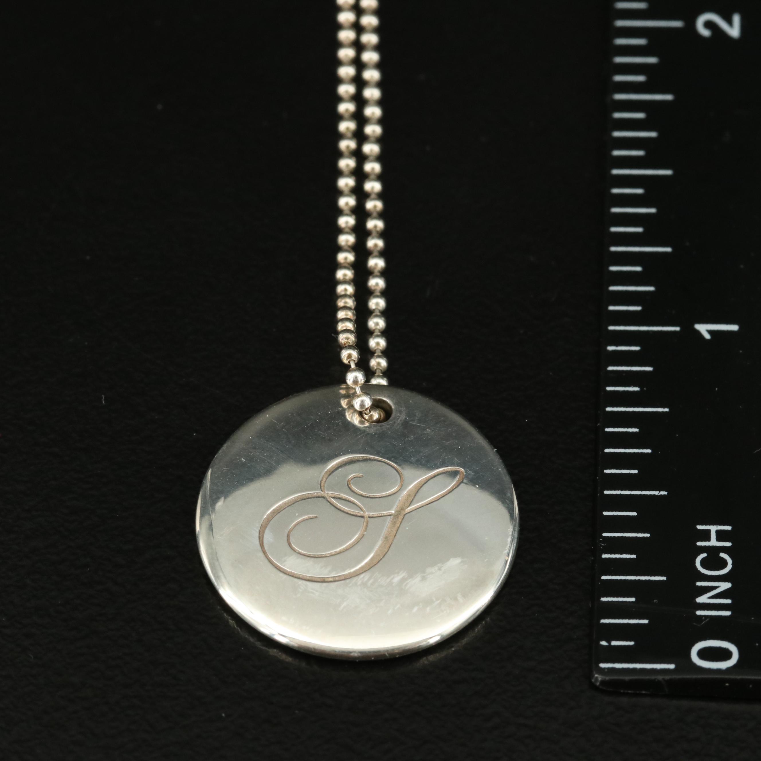 Tiffany & Co. Notes Alphabet Disc Charm Pendant Necklace