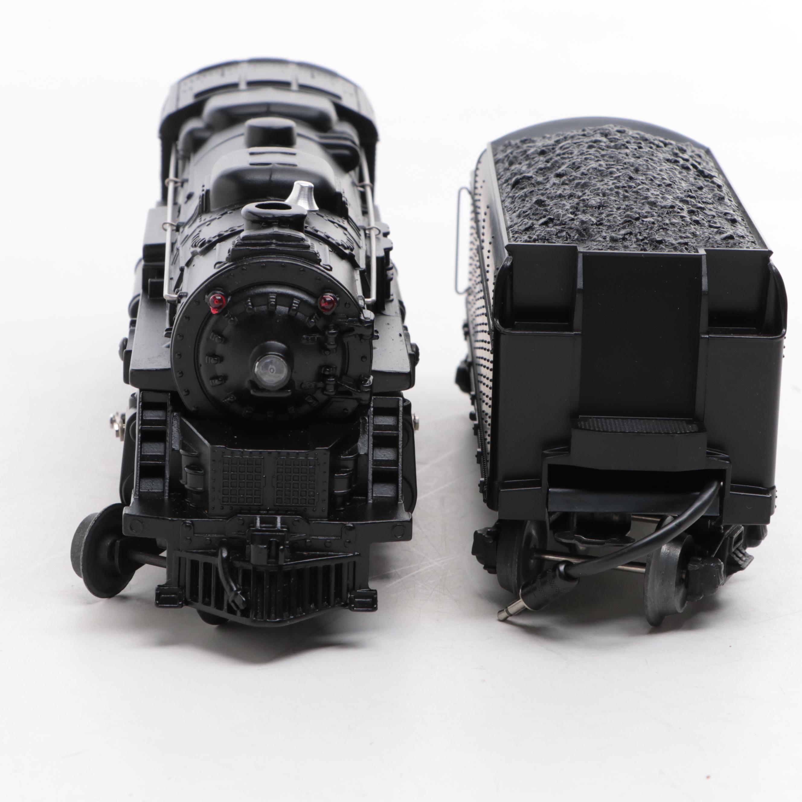 Lionel Trains Santa Fe Locomotive and Tender Car with Atlas Santa Fe Caboose