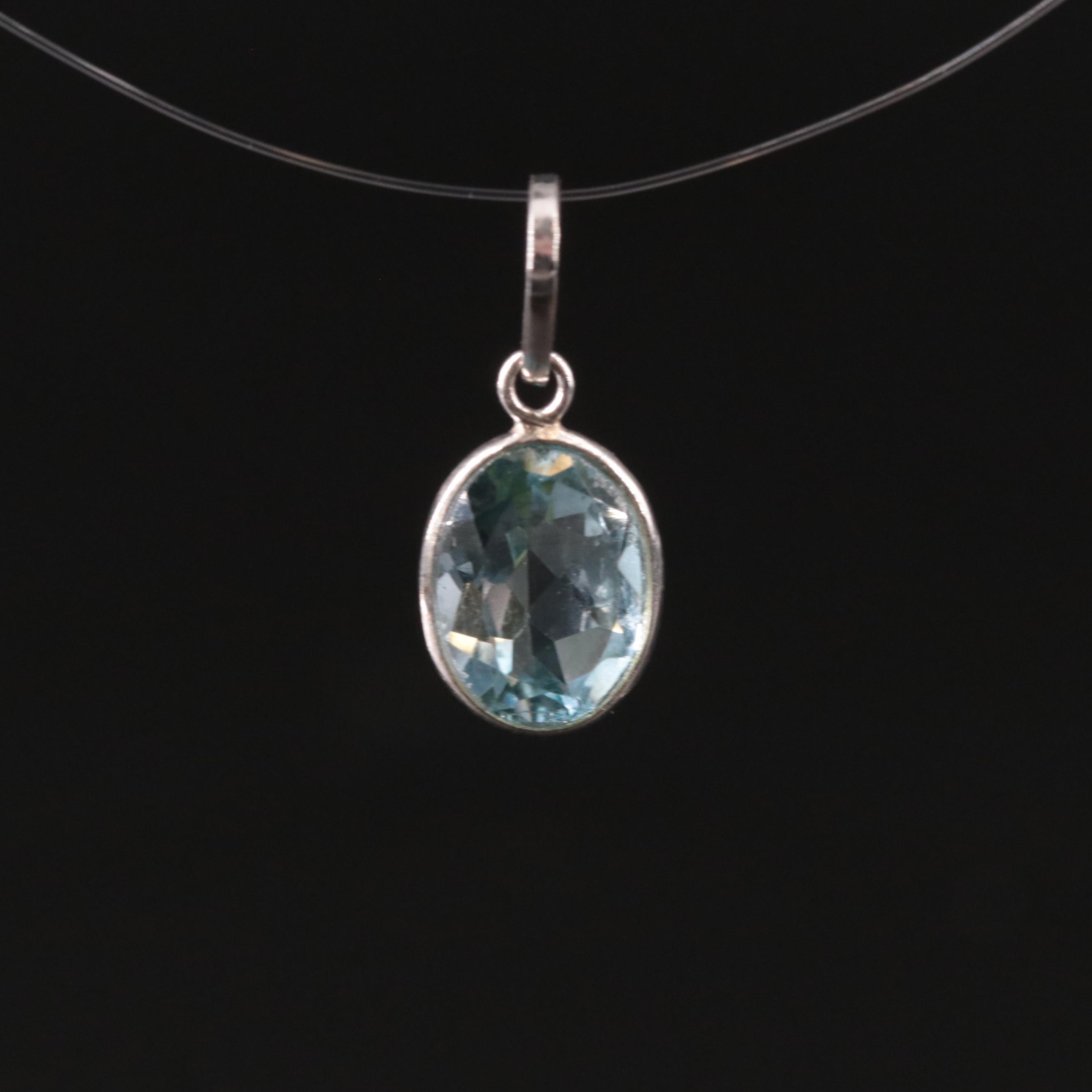 14K Blue Topaz Oval Pendant