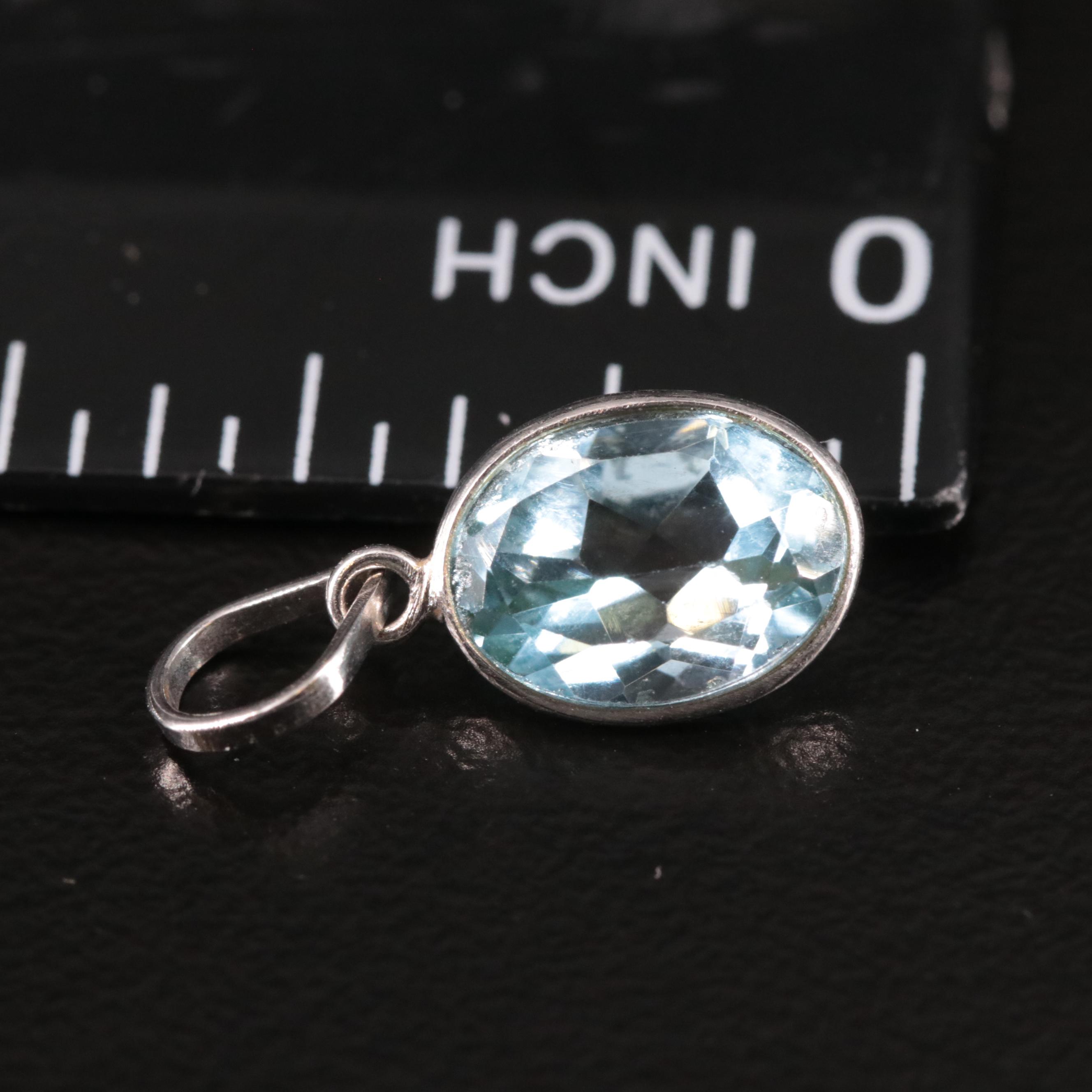 14K Blue Topaz Oval Pendant