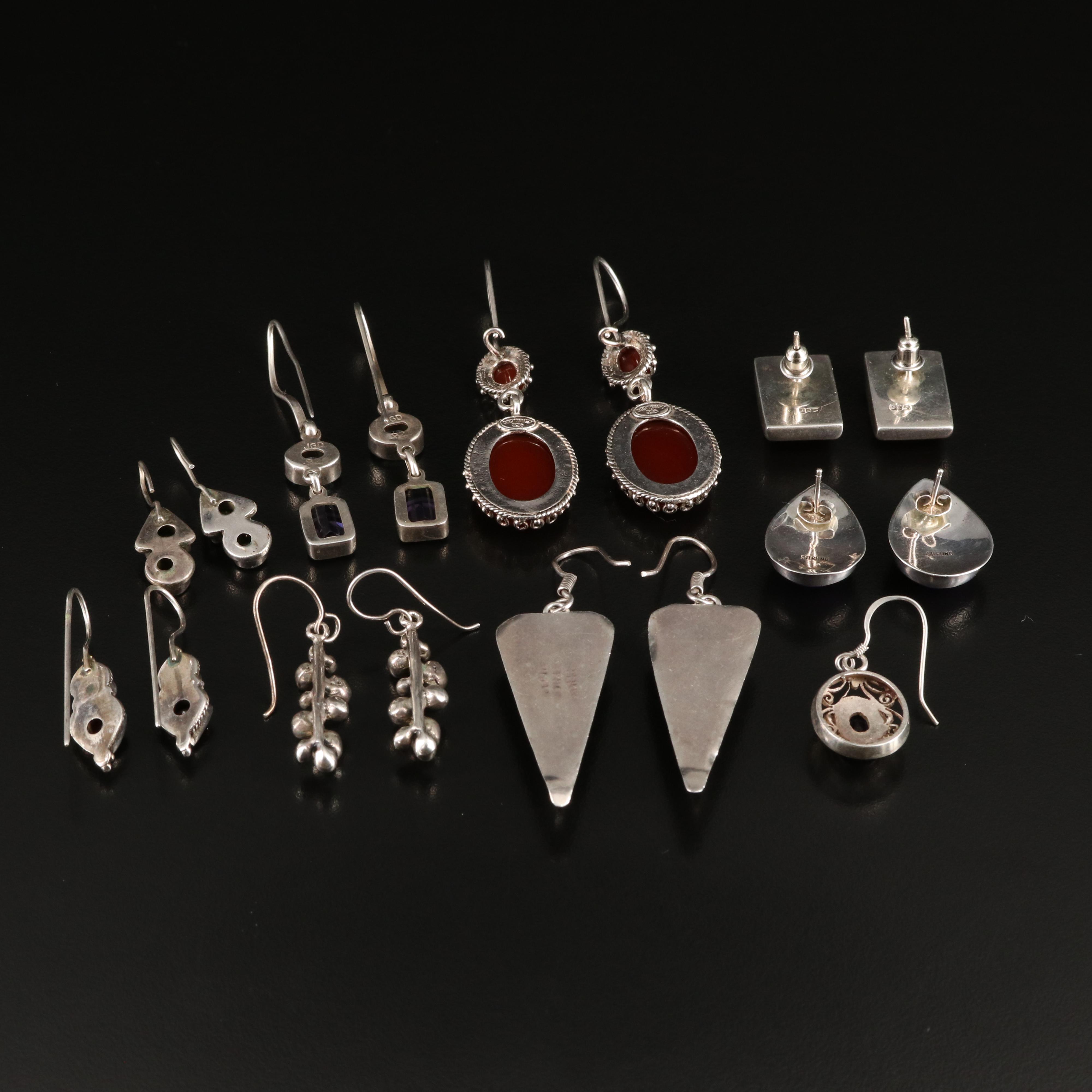 Swiss Blue Topaz and Amethyst Featured in Sterling Earring Collection