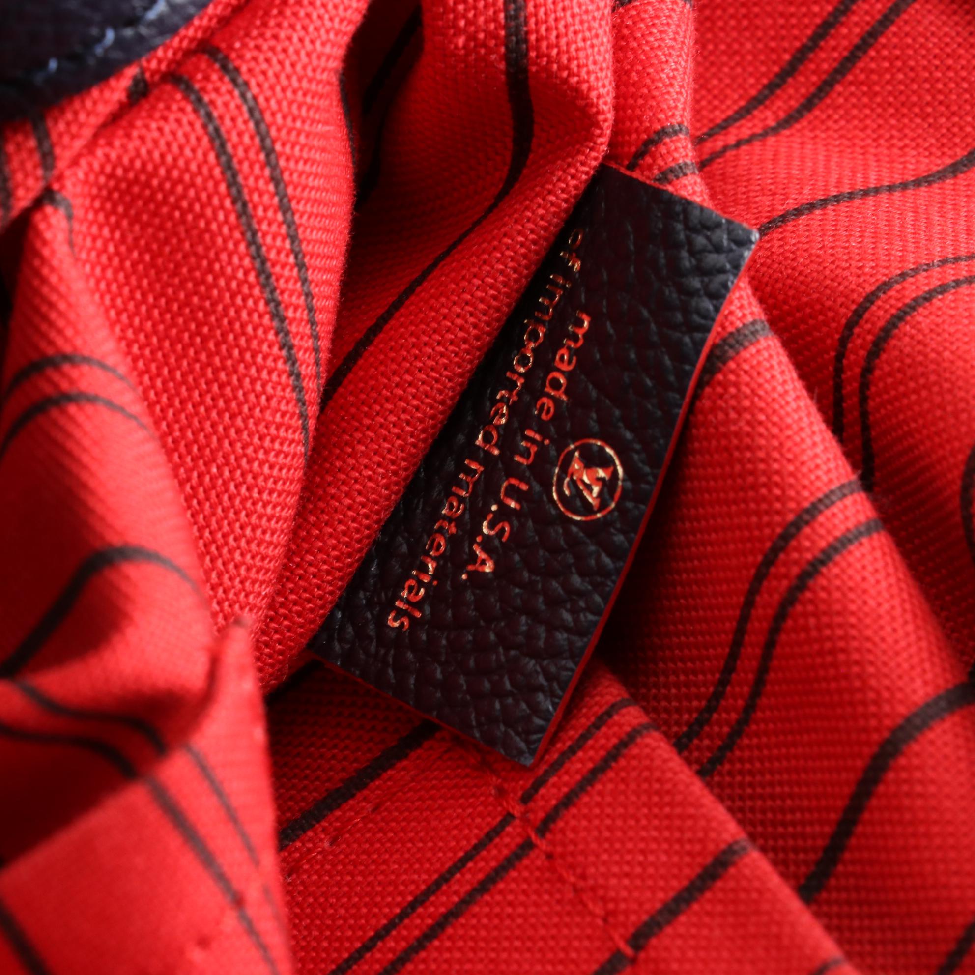 Louis Vuitton Melie Bag in Bleu Infini Empreinte Leather