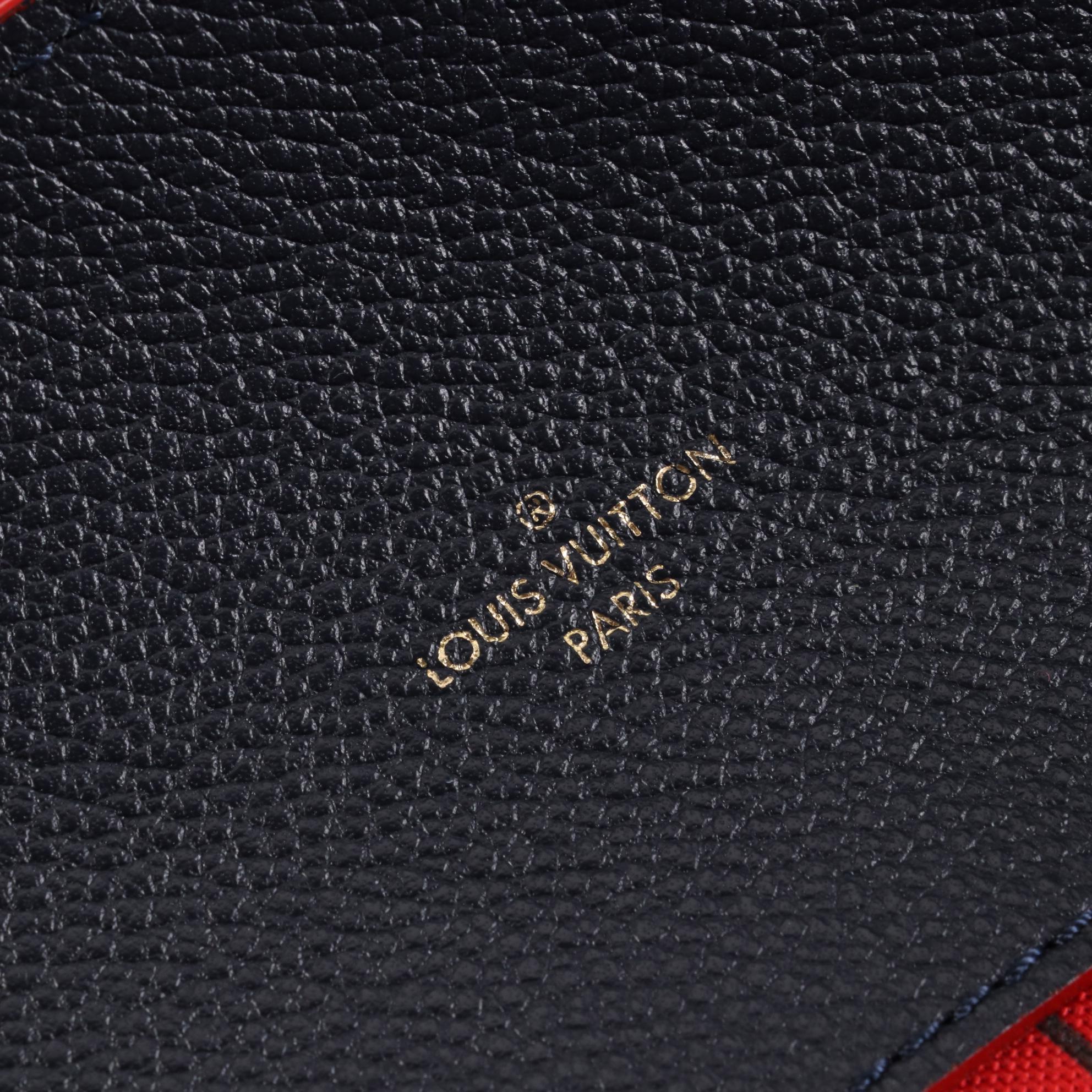 Louis Vuitton Melie Bag in Bleu Infini Empreinte Leather