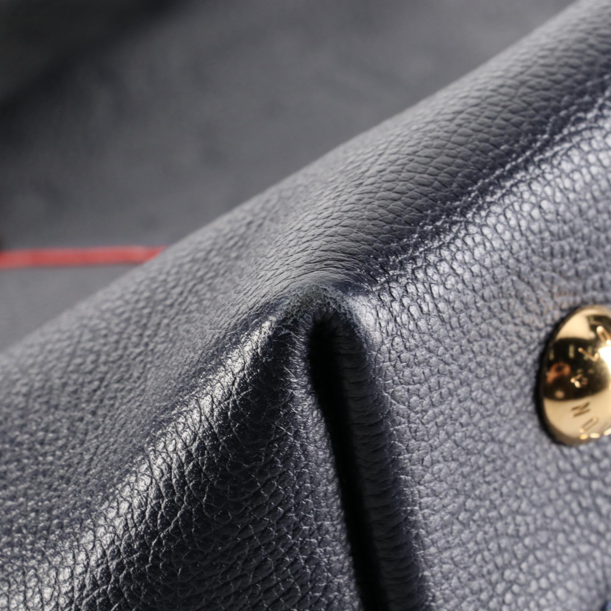 Louis Vuitton Melie Bag in Bleu Infini Empreinte Leather