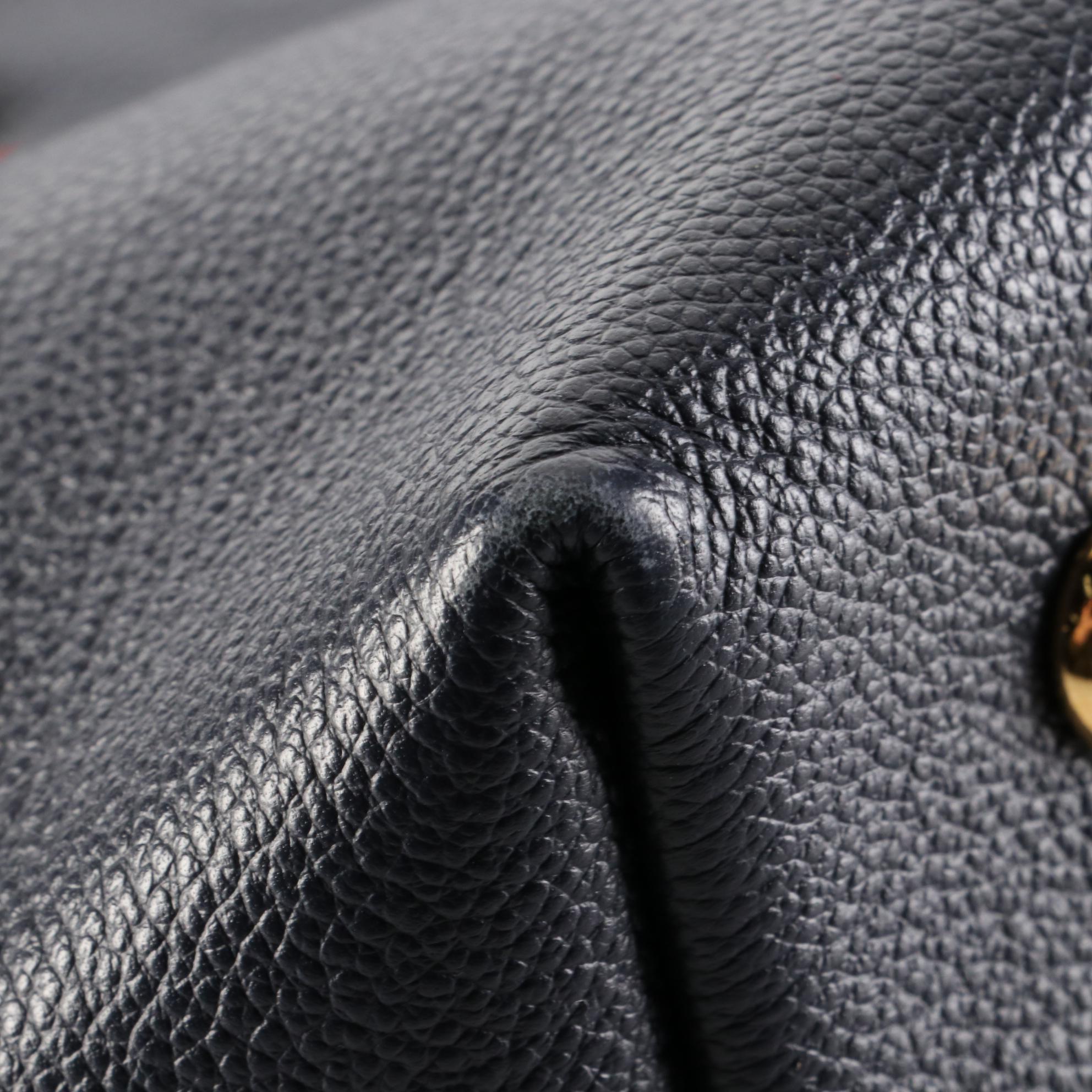 Louis Vuitton Melie Bag in Bleu Infini Empreinte Leather