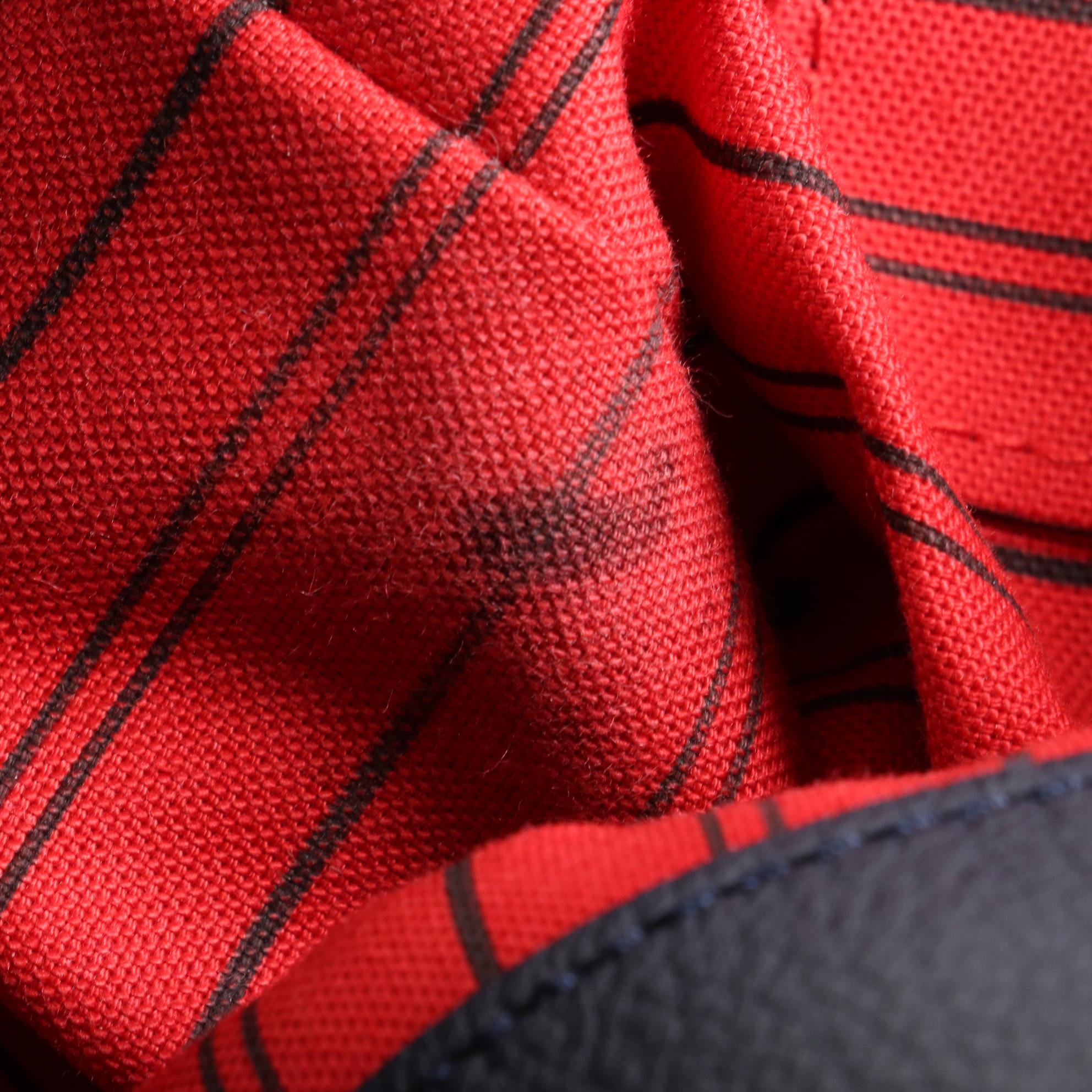 Louis Vuitton Melie Bag in Bleu Infini Empreinte Leather